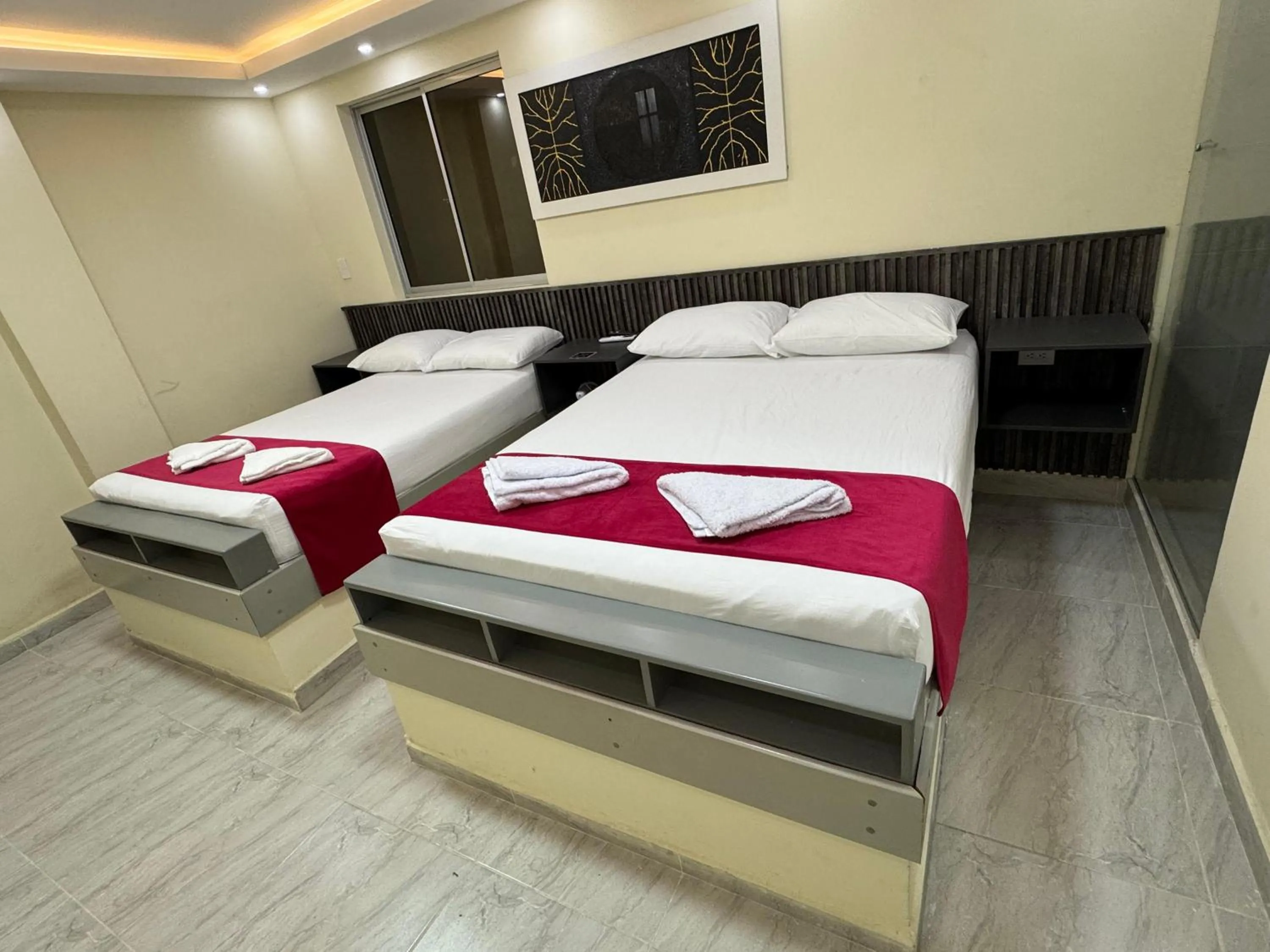 Bed in Hotel Magistral Suiter