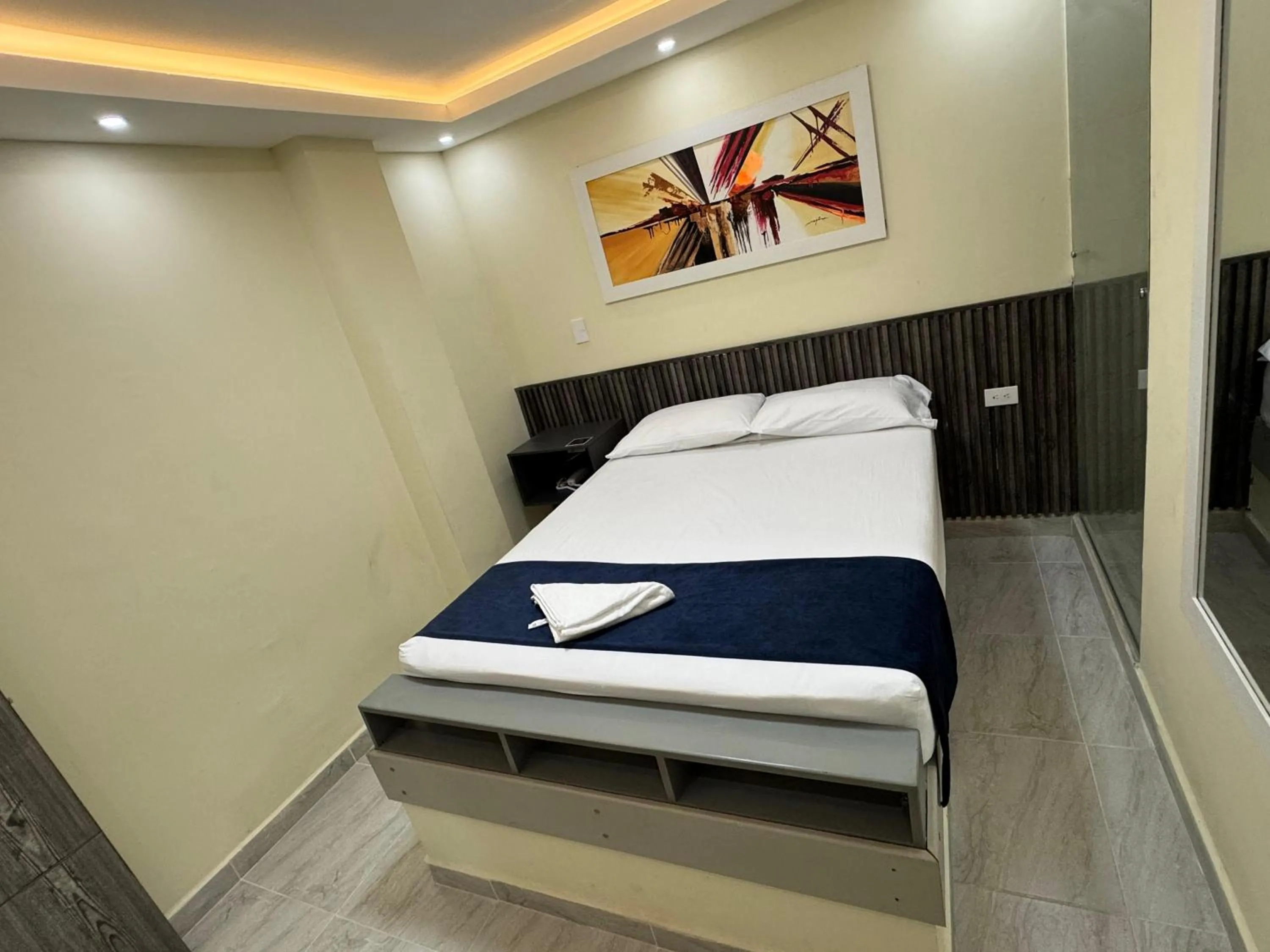 Bed in Hotel Magistral Suiter