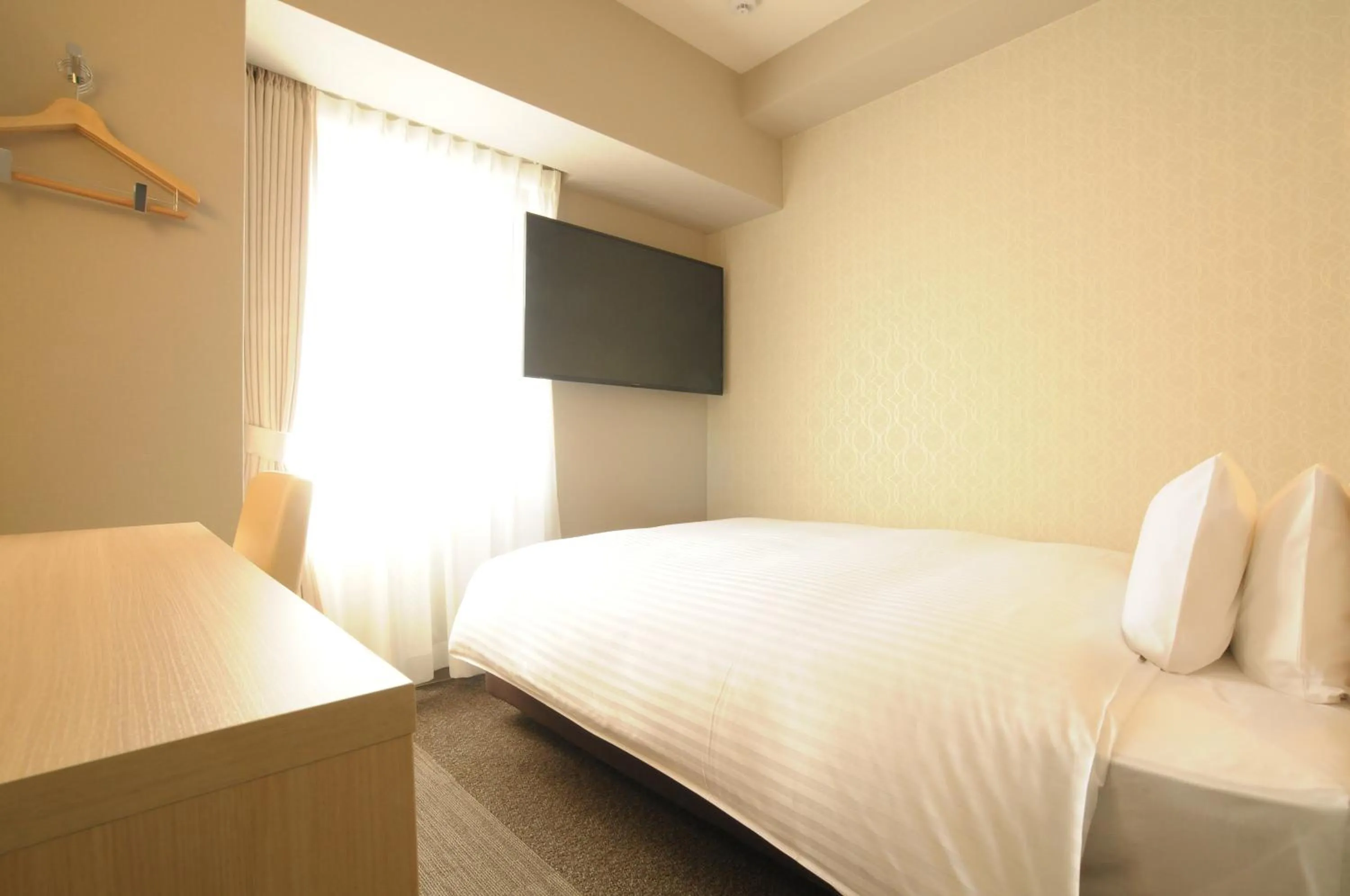 Bed in AB Hotel Tahara