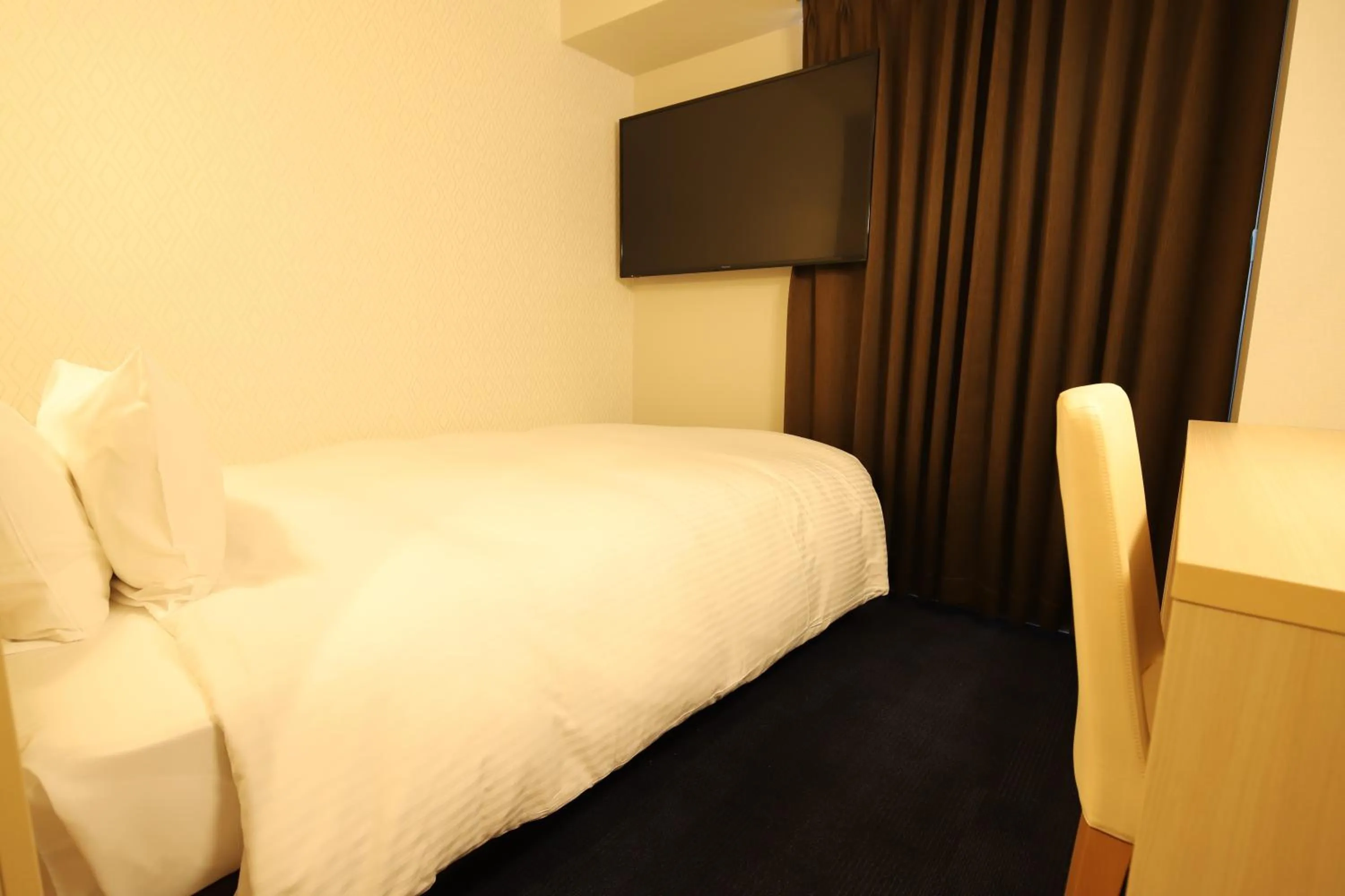 Bed in AB Hotel Gamagori