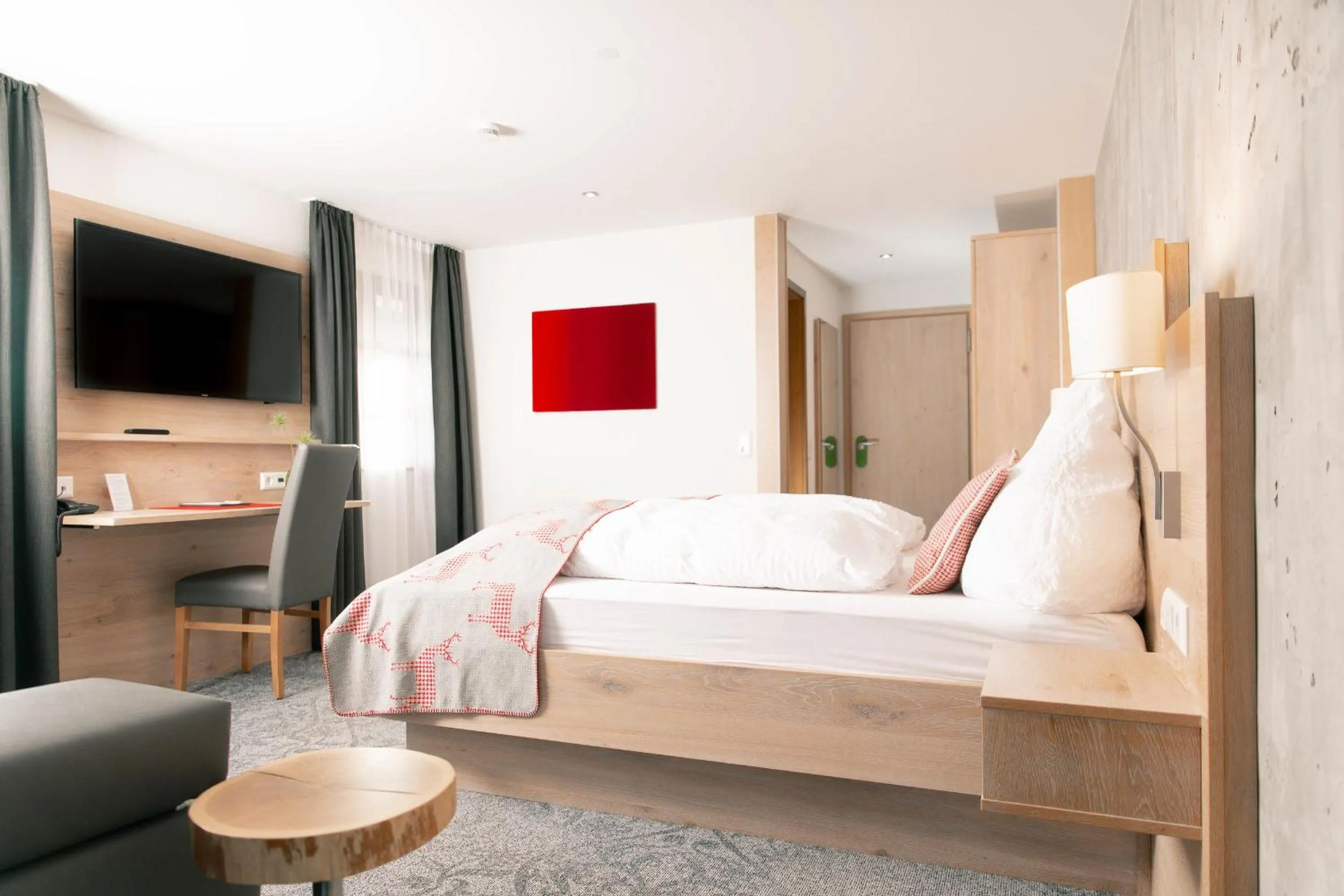 Photo of the whole room, Bed in Genusshotel Hirschen - Erholung im Grünen (Südschwarzwald)