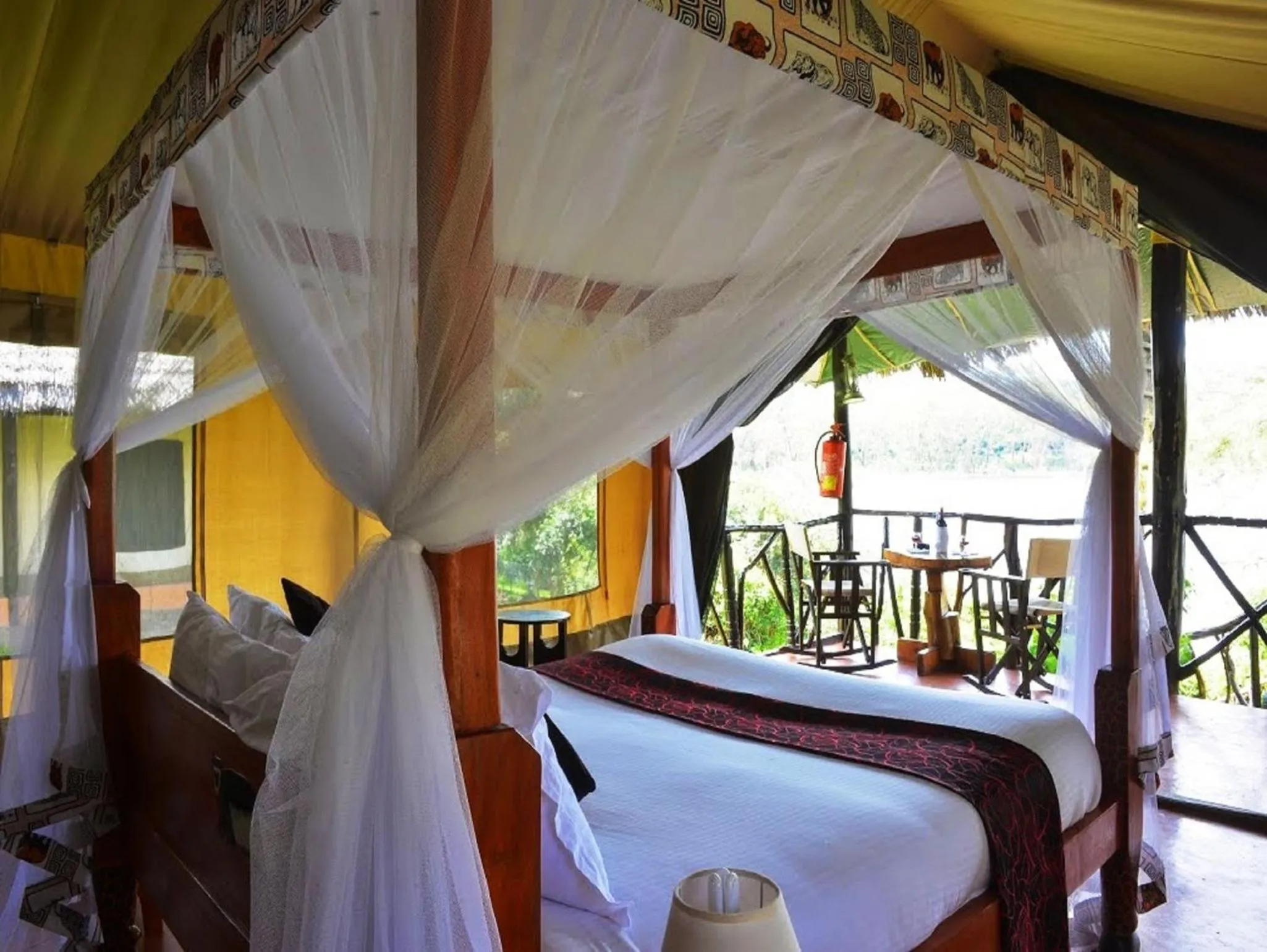 Bed in Crater Lake Tented Camp And Game Sanctuary