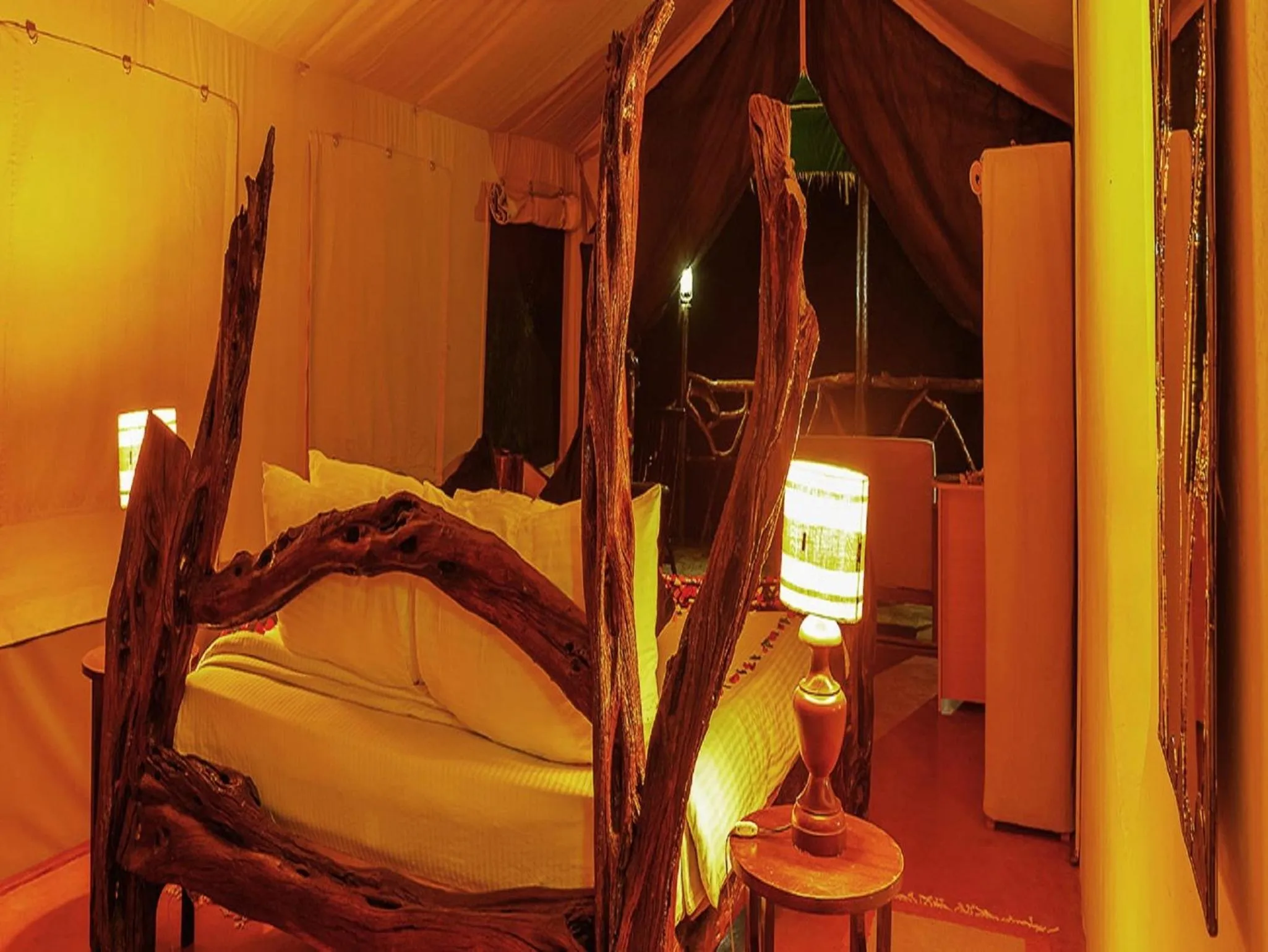 Bed in Crater Lake Tented Camp And Game Sanctuary