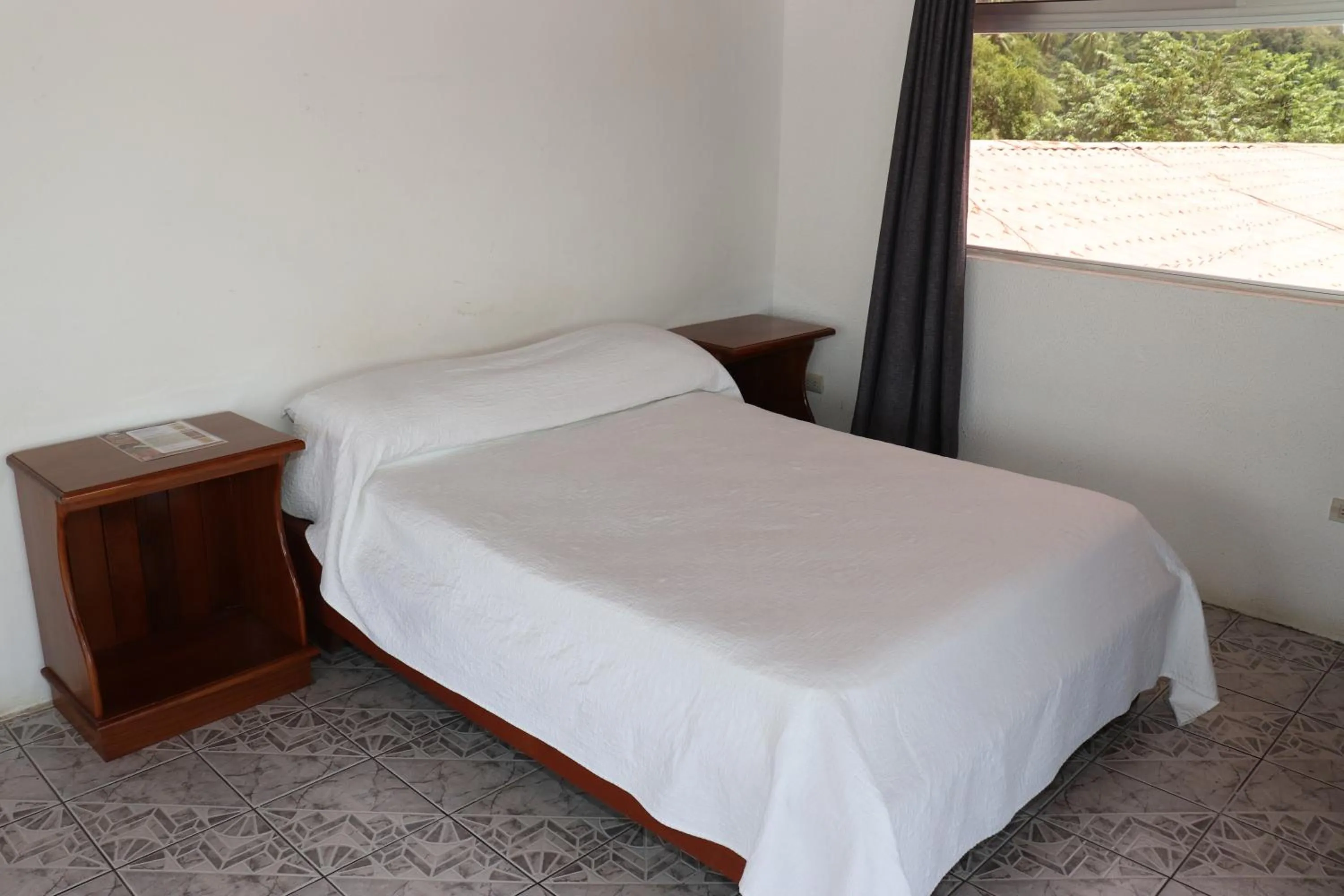 Bed in Hotel Samoa del Sur