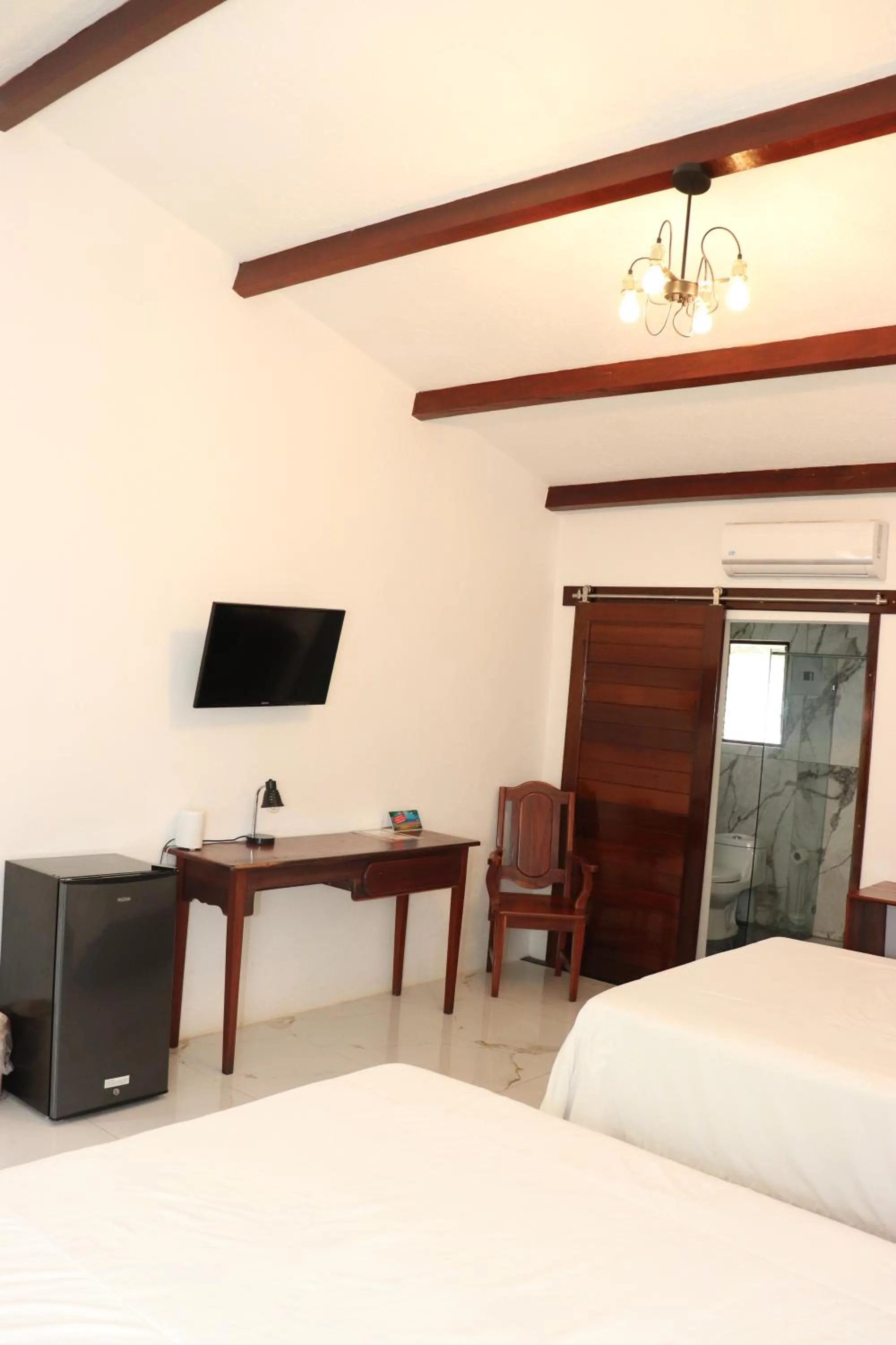 Bed in Hotel Samoa del Sur