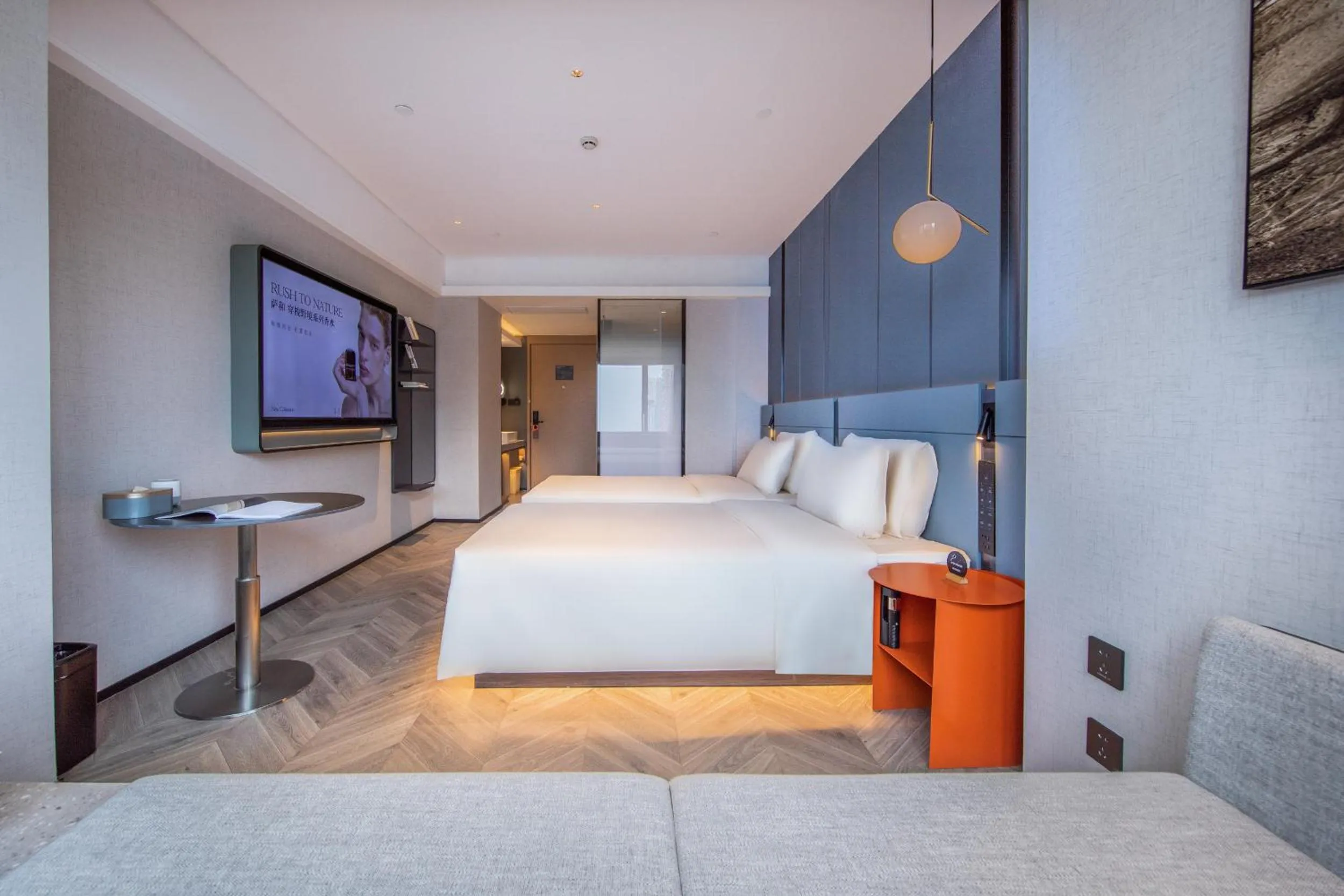 Photo of the whole room, Bed in Atour Hotel Wuhan Wuchang Zhongnan Road