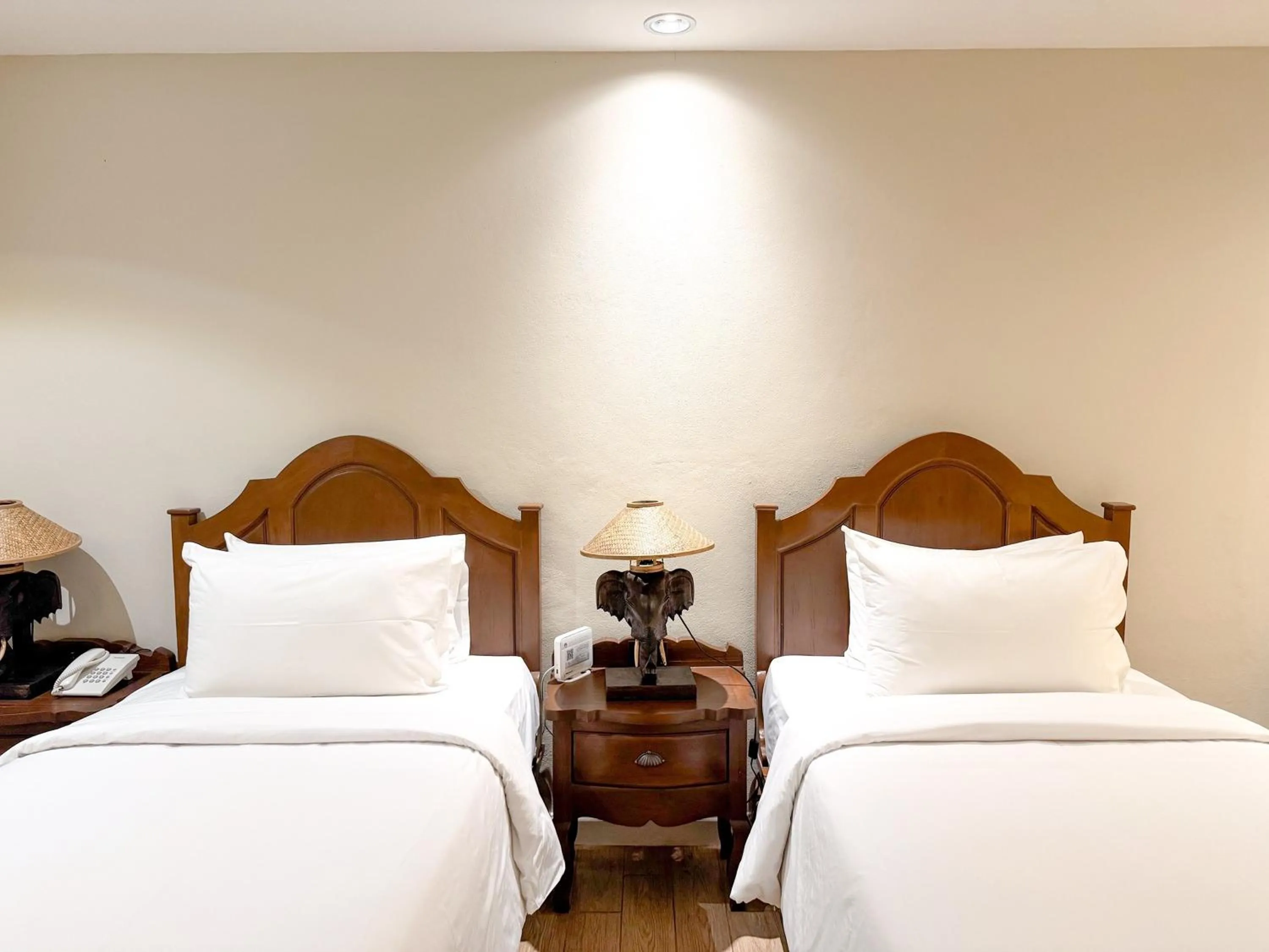 Bed in Kokhaburi Hotel