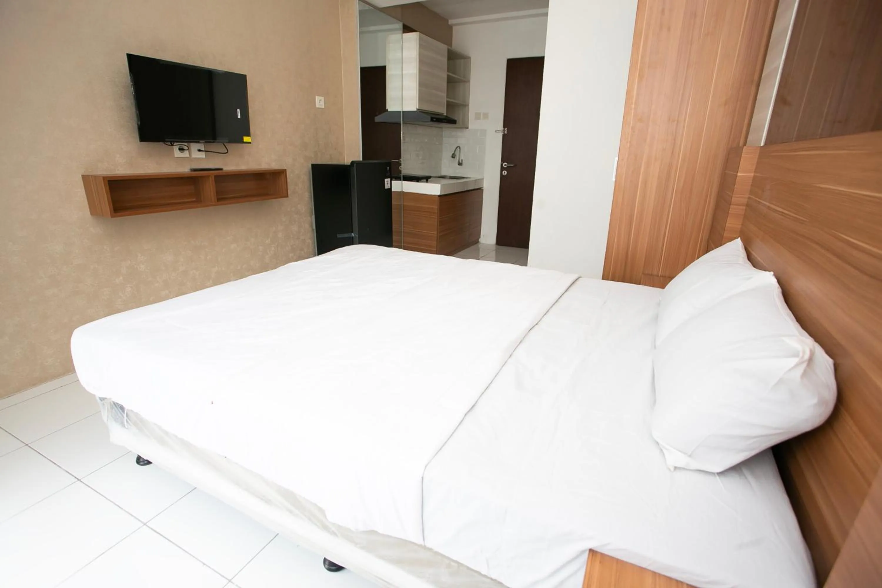 Bedroom, Bed in Collection O metroploitian park Serviced Apartmen