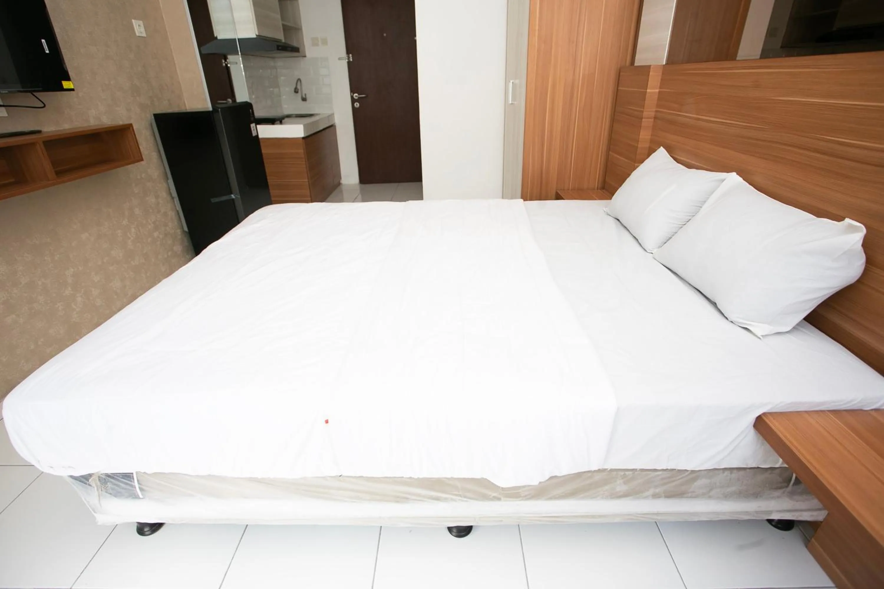 Bedroom, Bed in Collection O metroploitian park Serviced Apartmen