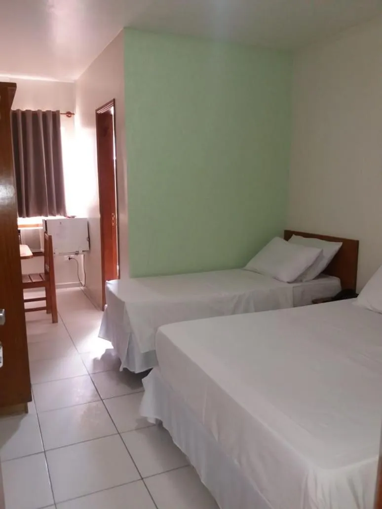 Bed in Ipê Guaru Hotel