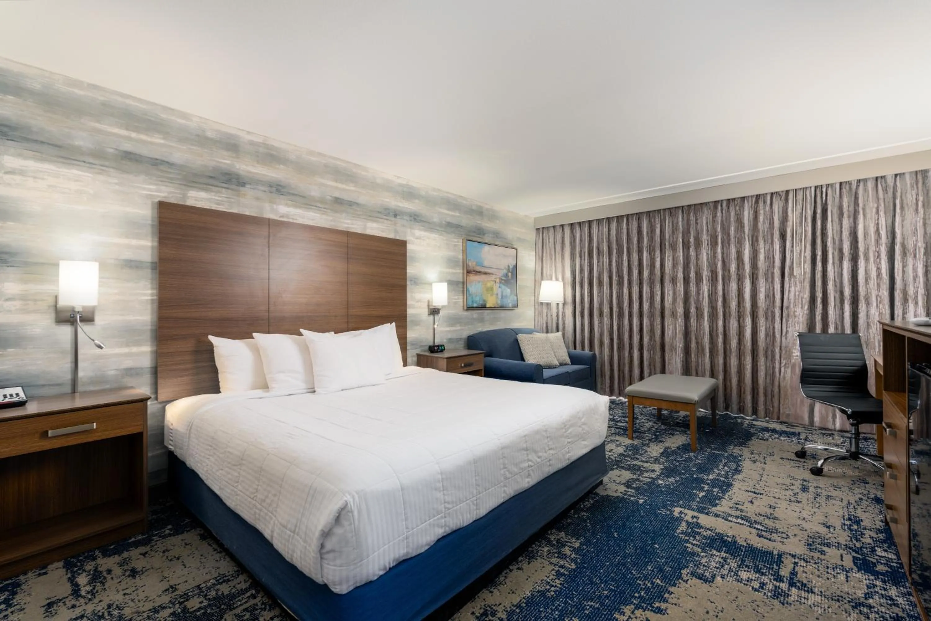 Bed in MCM Elegante Hotel