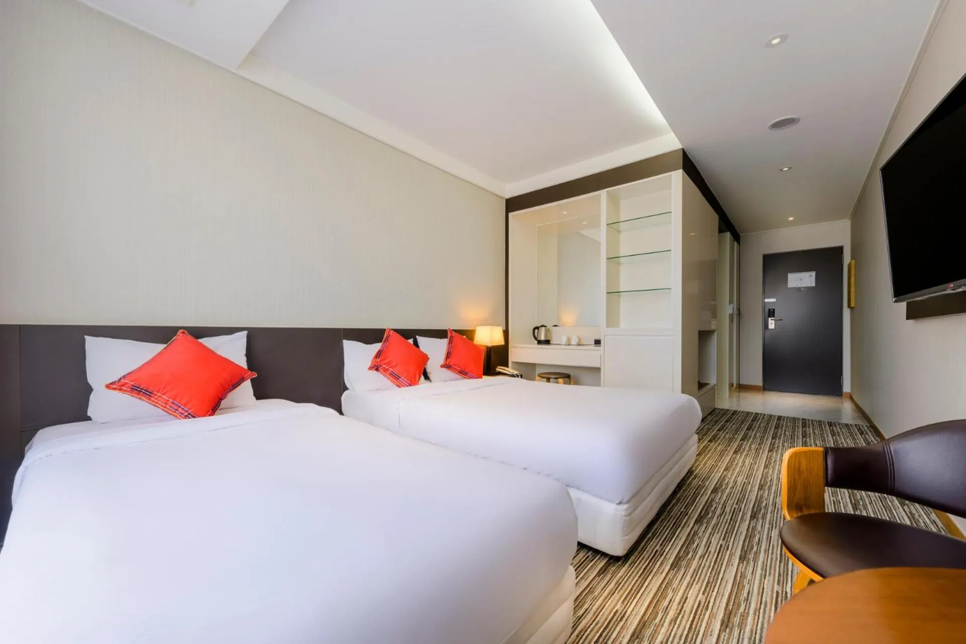 Bed in Shin Shin Hotel Jeju Worldcup