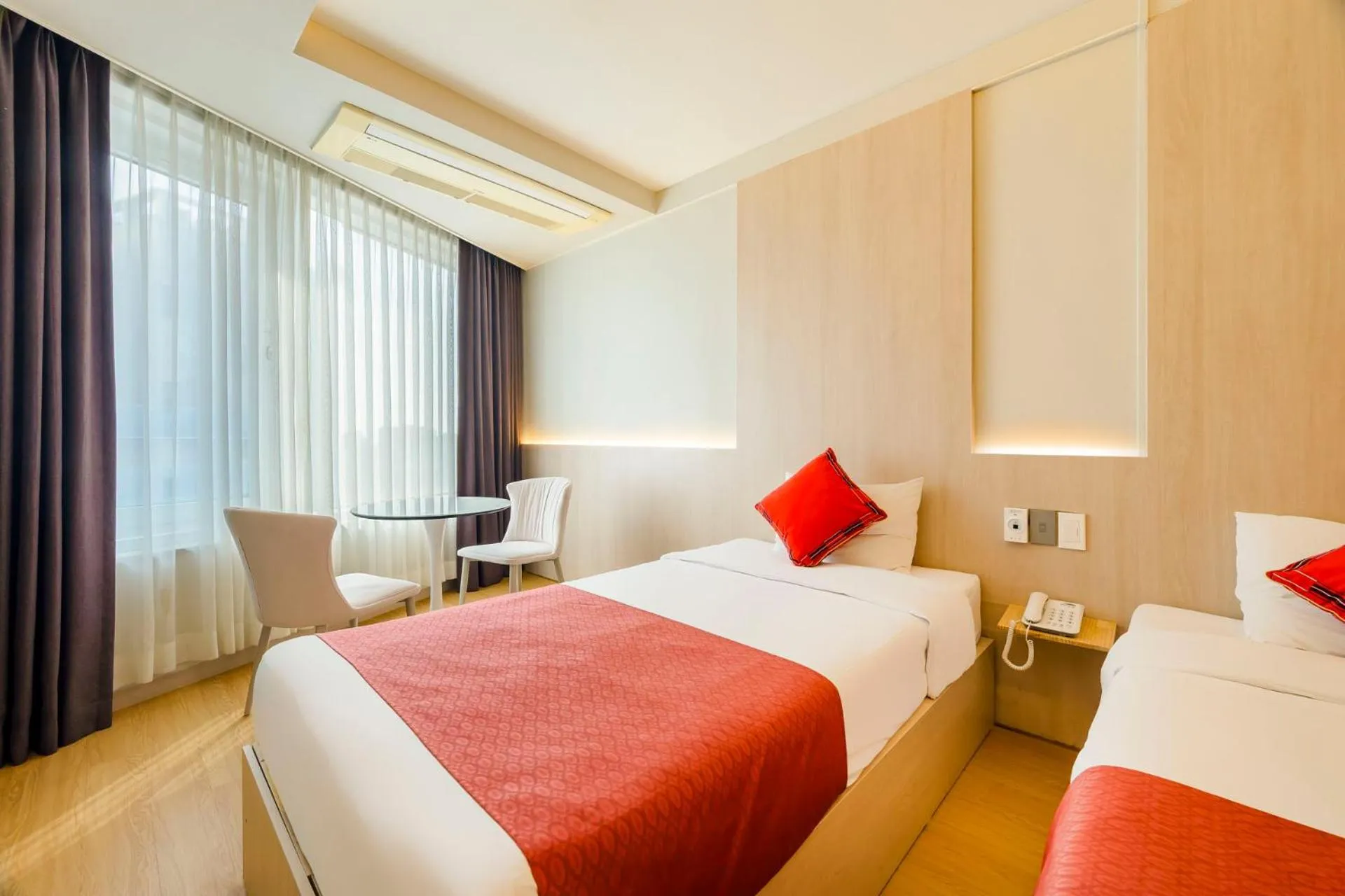 Bed in Shin Shin Hotel Jeju Worldcup