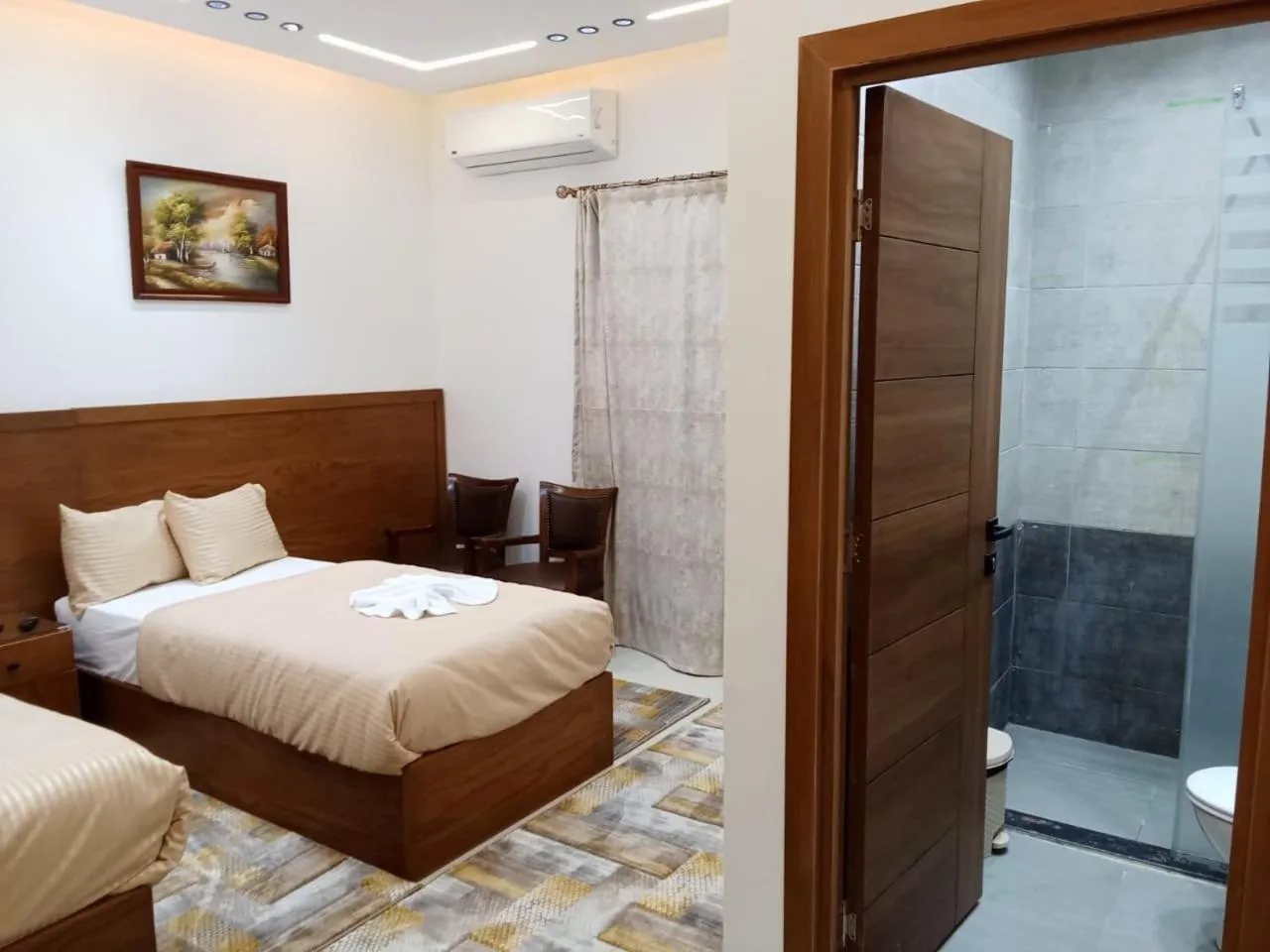 Bed in New Panorama Inn