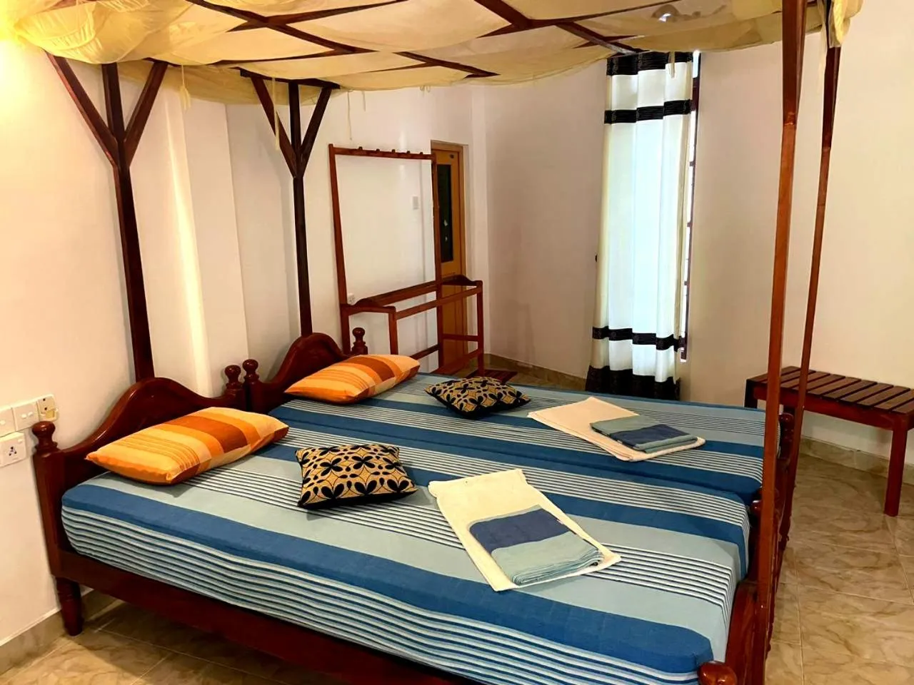 Bed in La Safari Inn Tissamaharama