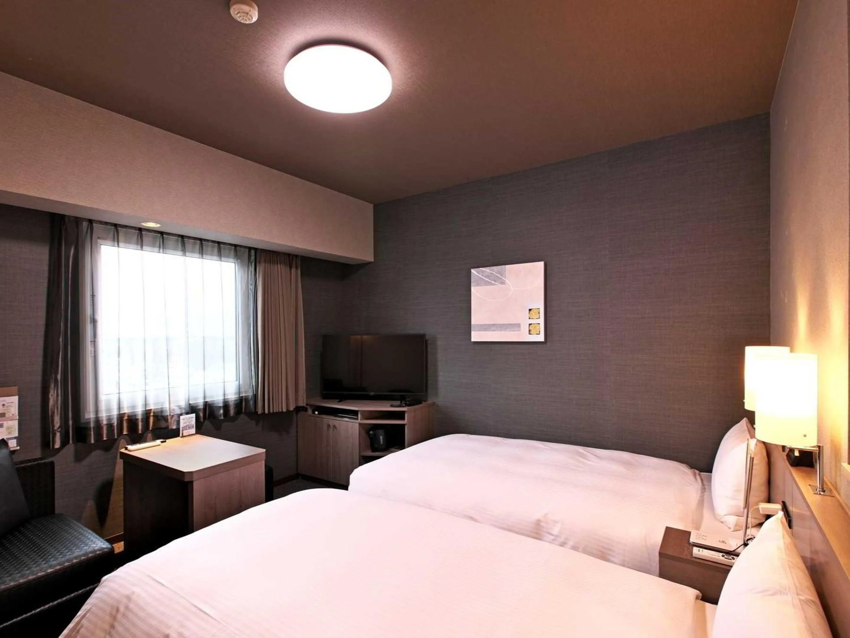 Photo of the whole room, Bed in Hotel Route Inn Grand Moriya Ekimae