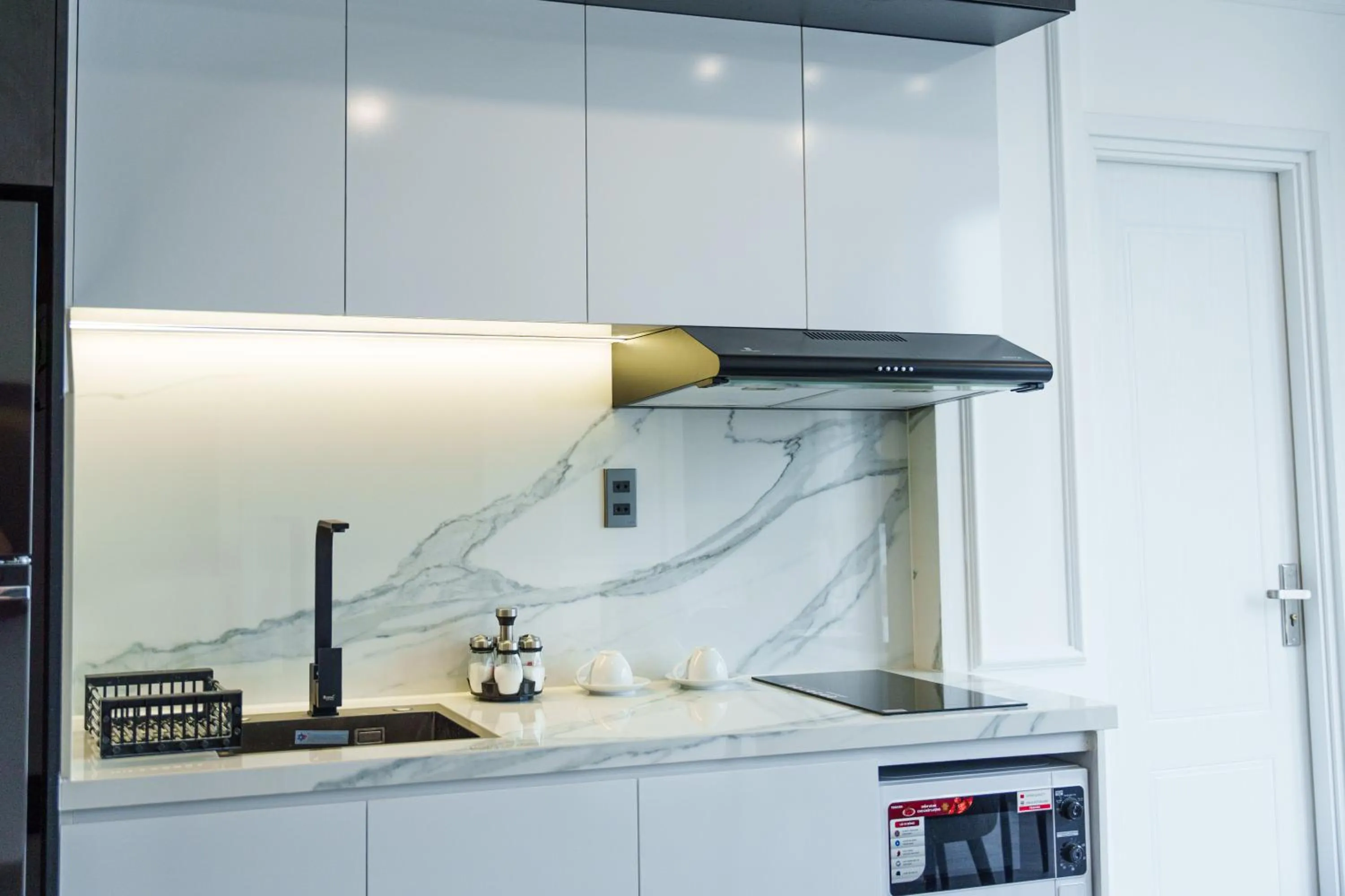 Kitchen or kitchenette in CityHouse- El Pino Realm at Metro Ben Thanh Market