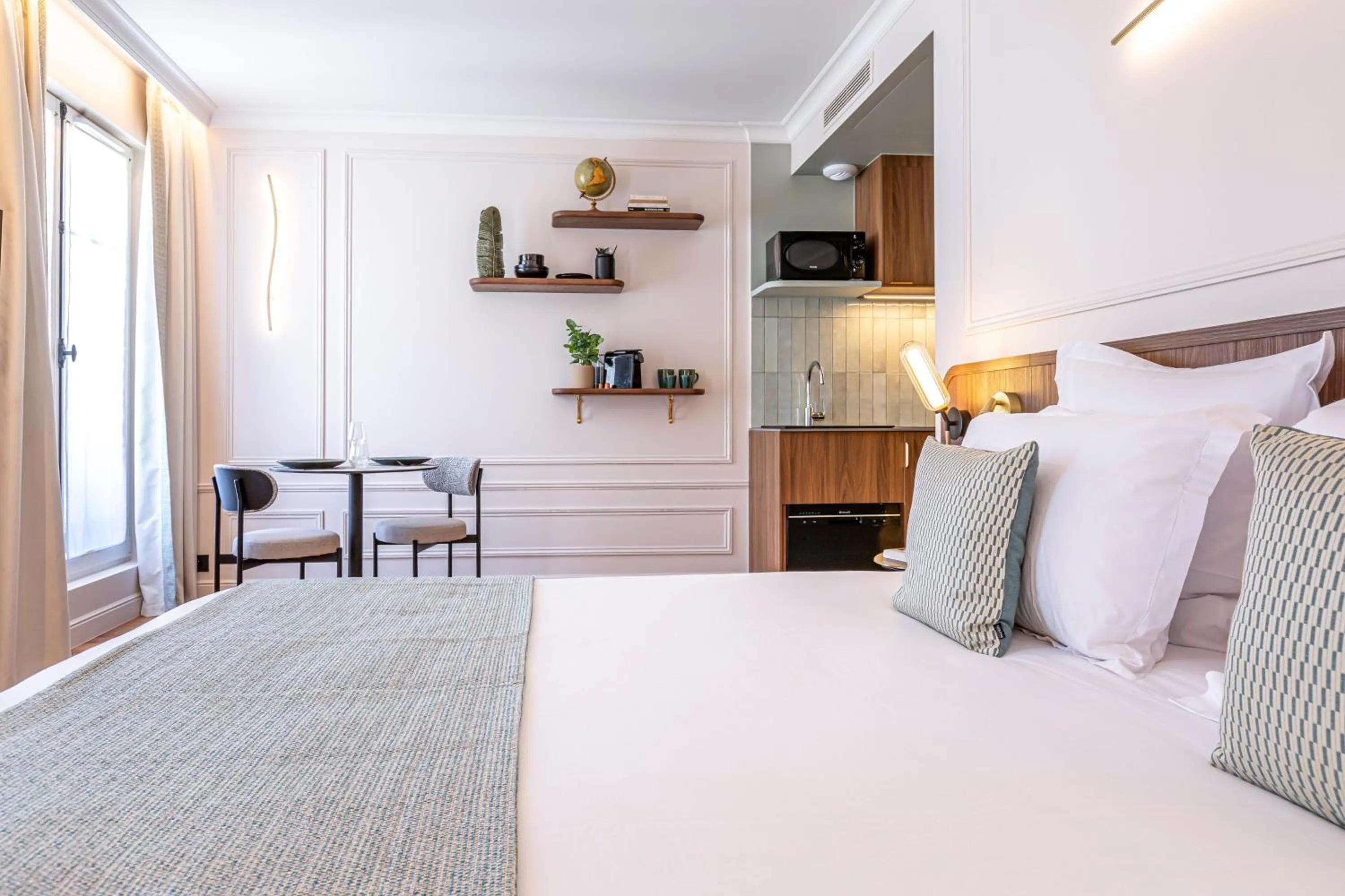 Bed in Villa SoPi Appart'Hotel by Patrick Hayat