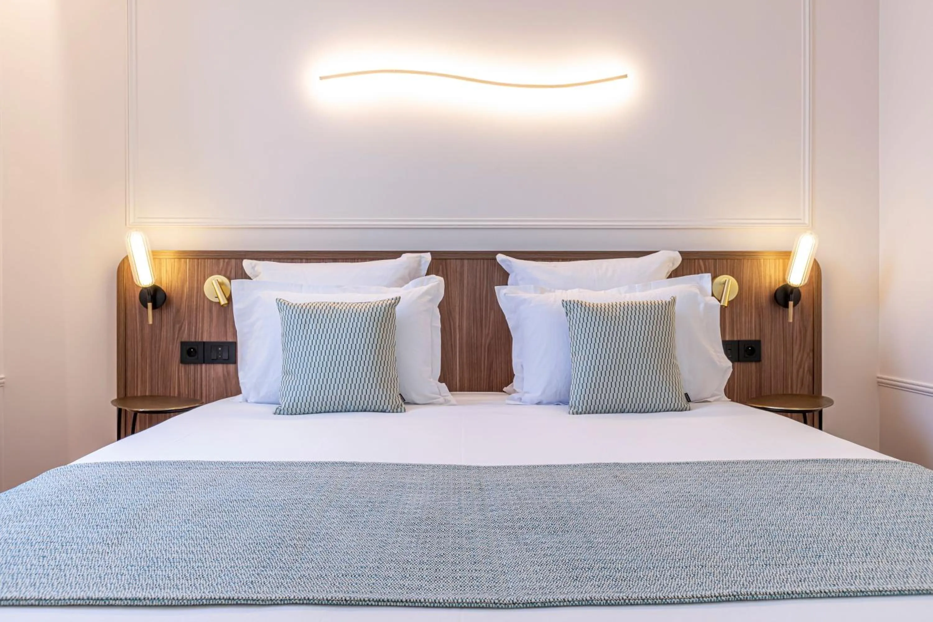 Bed in Villa SoPi Appart'Hotel by Patrick Hayat