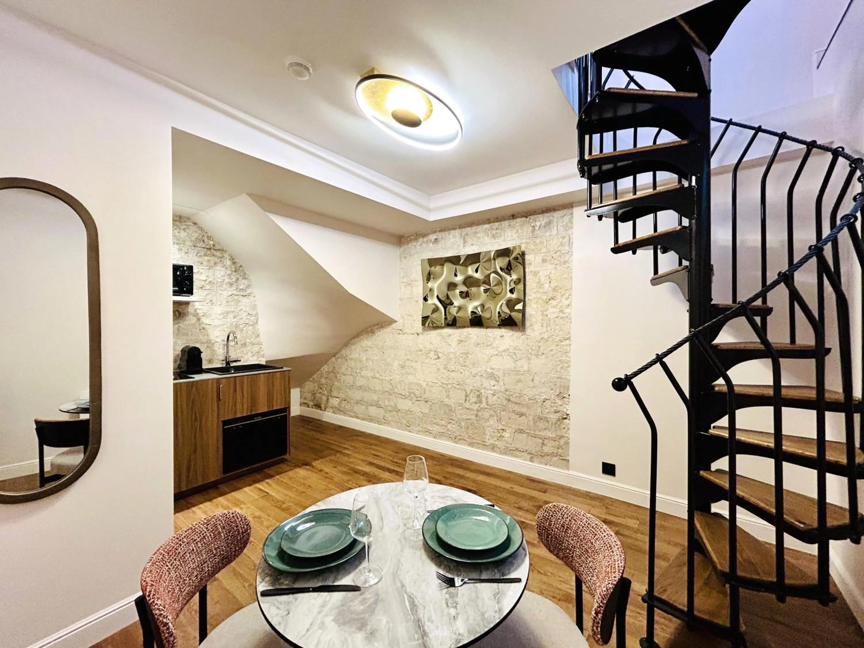 Kitchen or kitchenette in Villa SoPi Appart'Hotel by Patrick Hayat