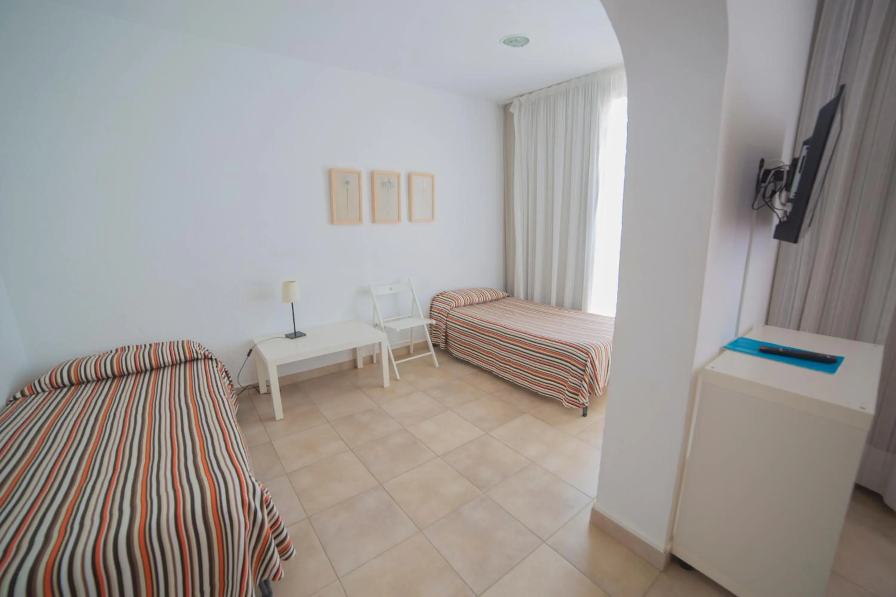 Bed in Casa Del Mar Hotel & Apartaments