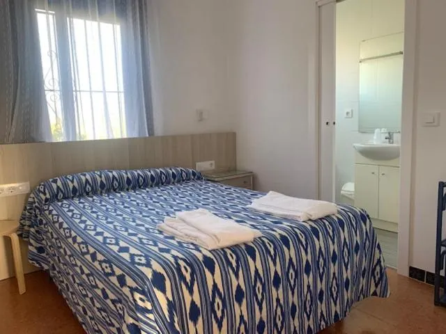 Bed in Casa Del Mar Hotel & Apartaments