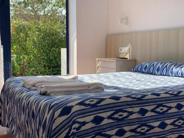 Bed in Casa Del Mar Hotel & Apartaments