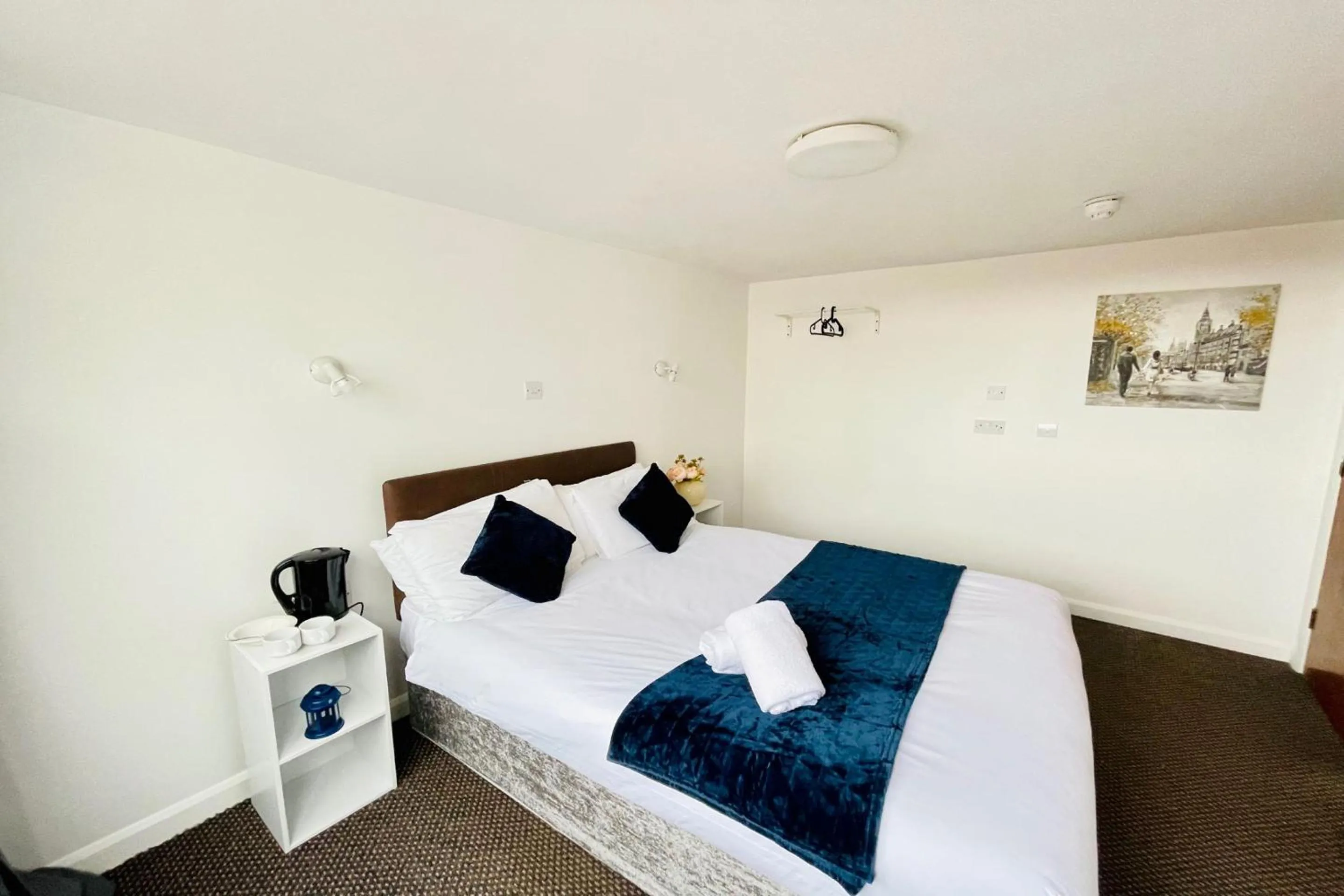 Bedroom in OYO The Sun Hotel