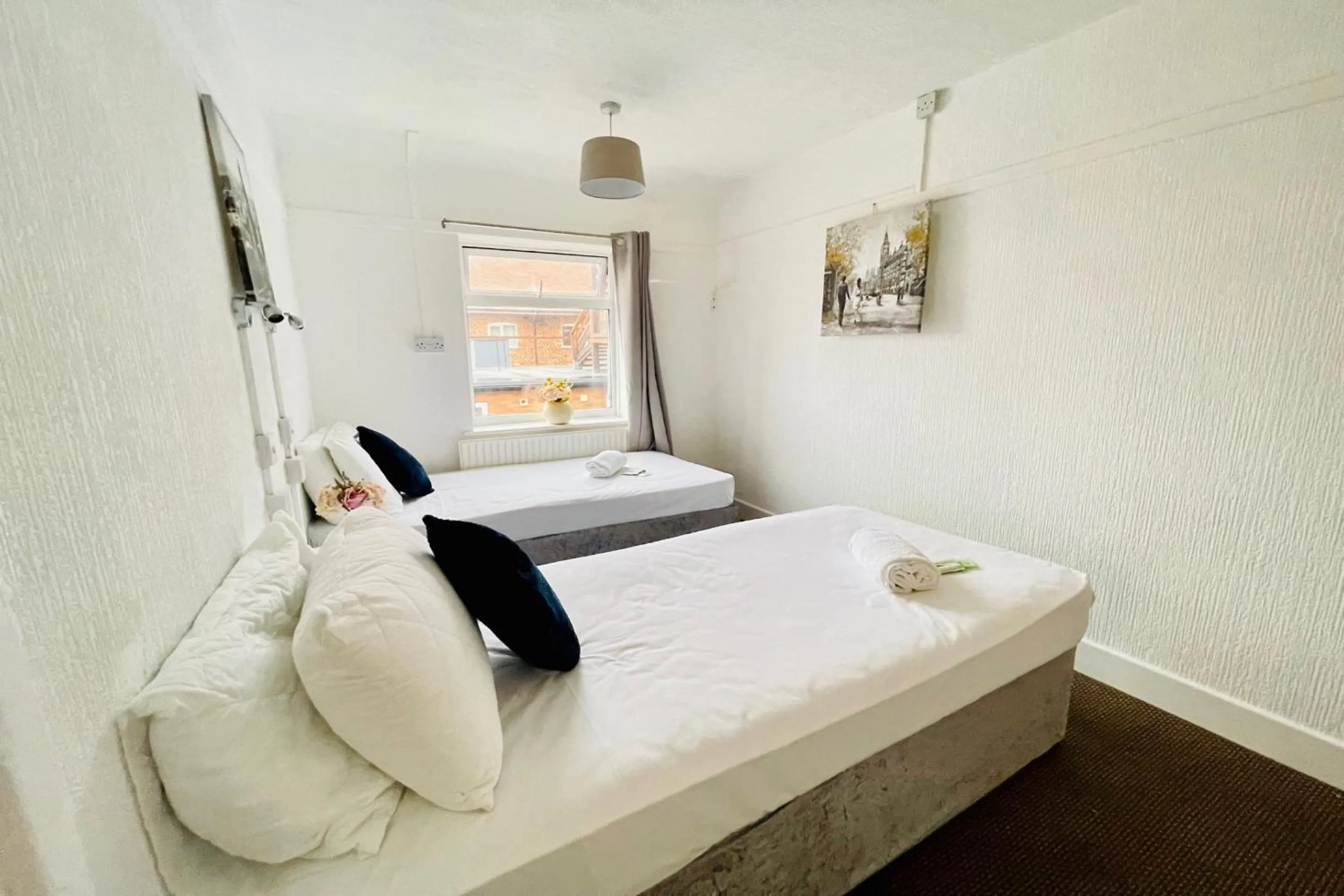 Bedroom in OYO The Sun Hotel