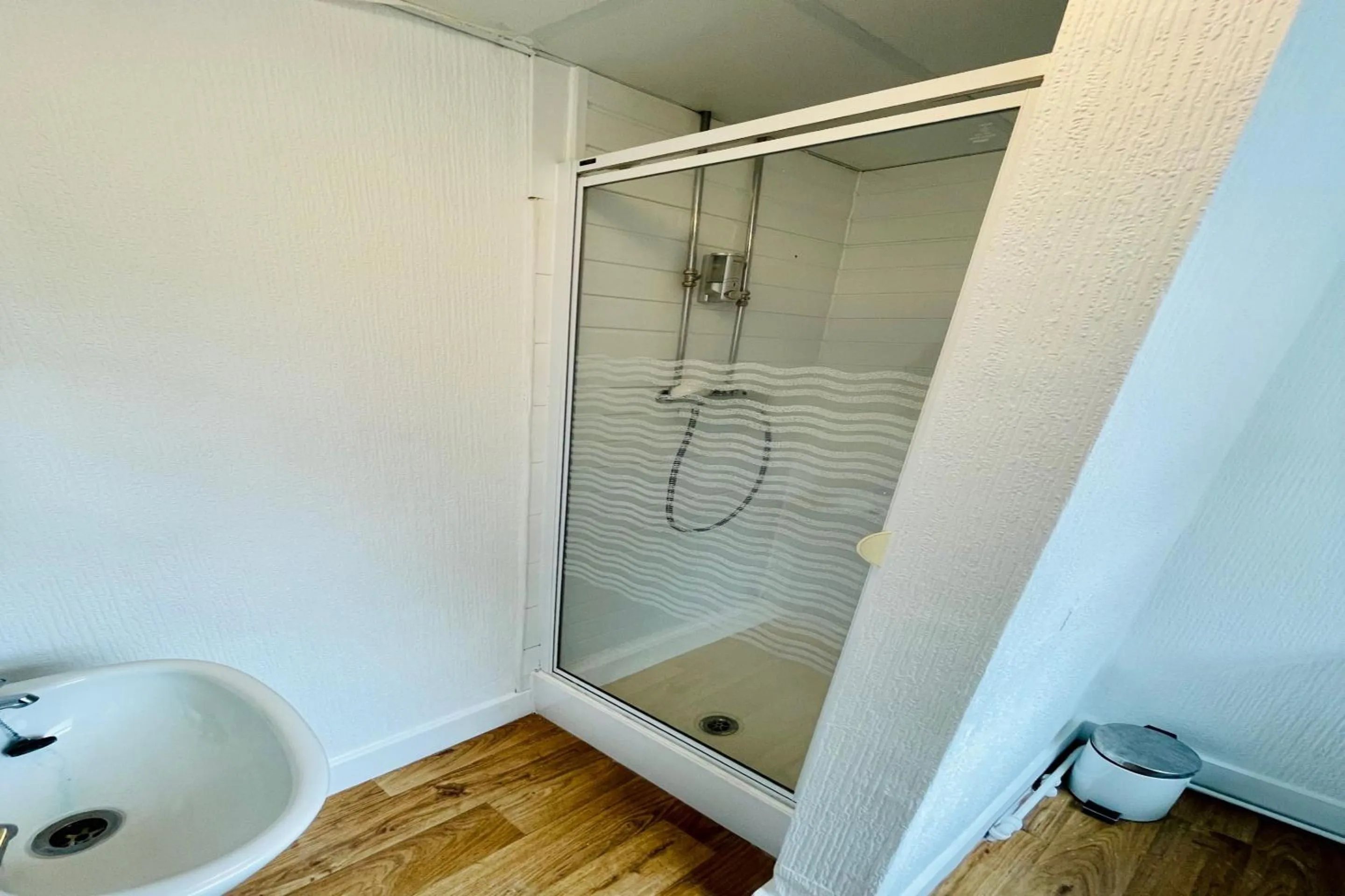 Bathroom in OYO The Sun Hotel