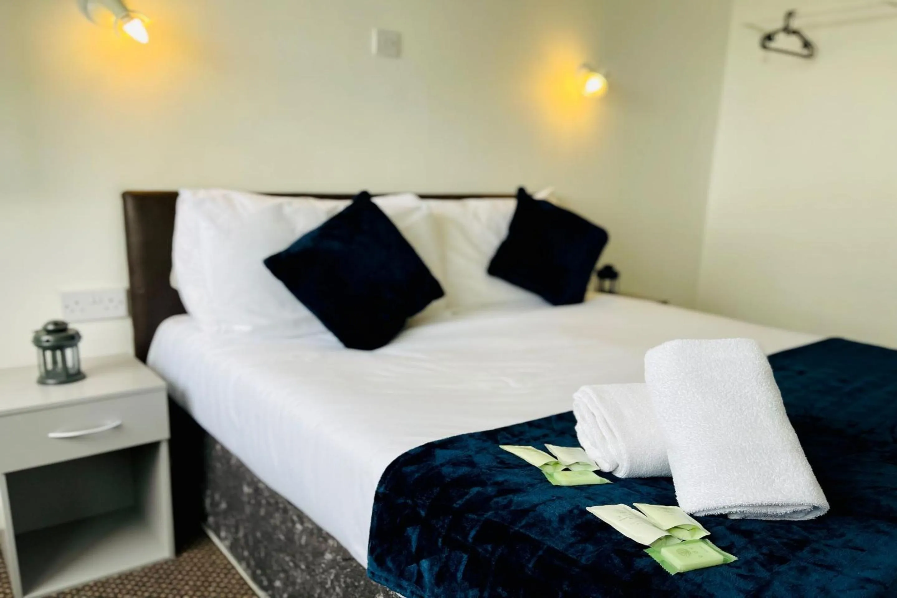 Bedroom in OYO The Sun Hotel