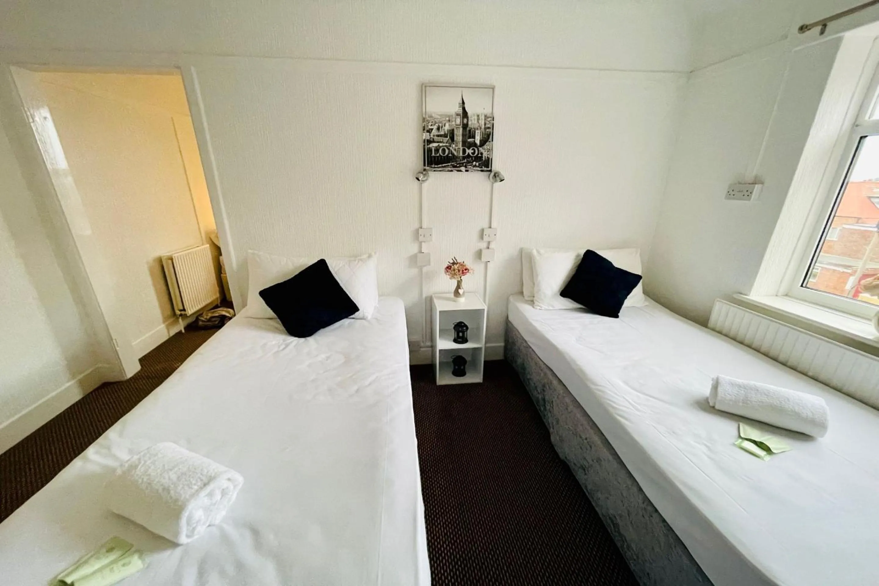 Bedroom in OYO The Sun Hotel