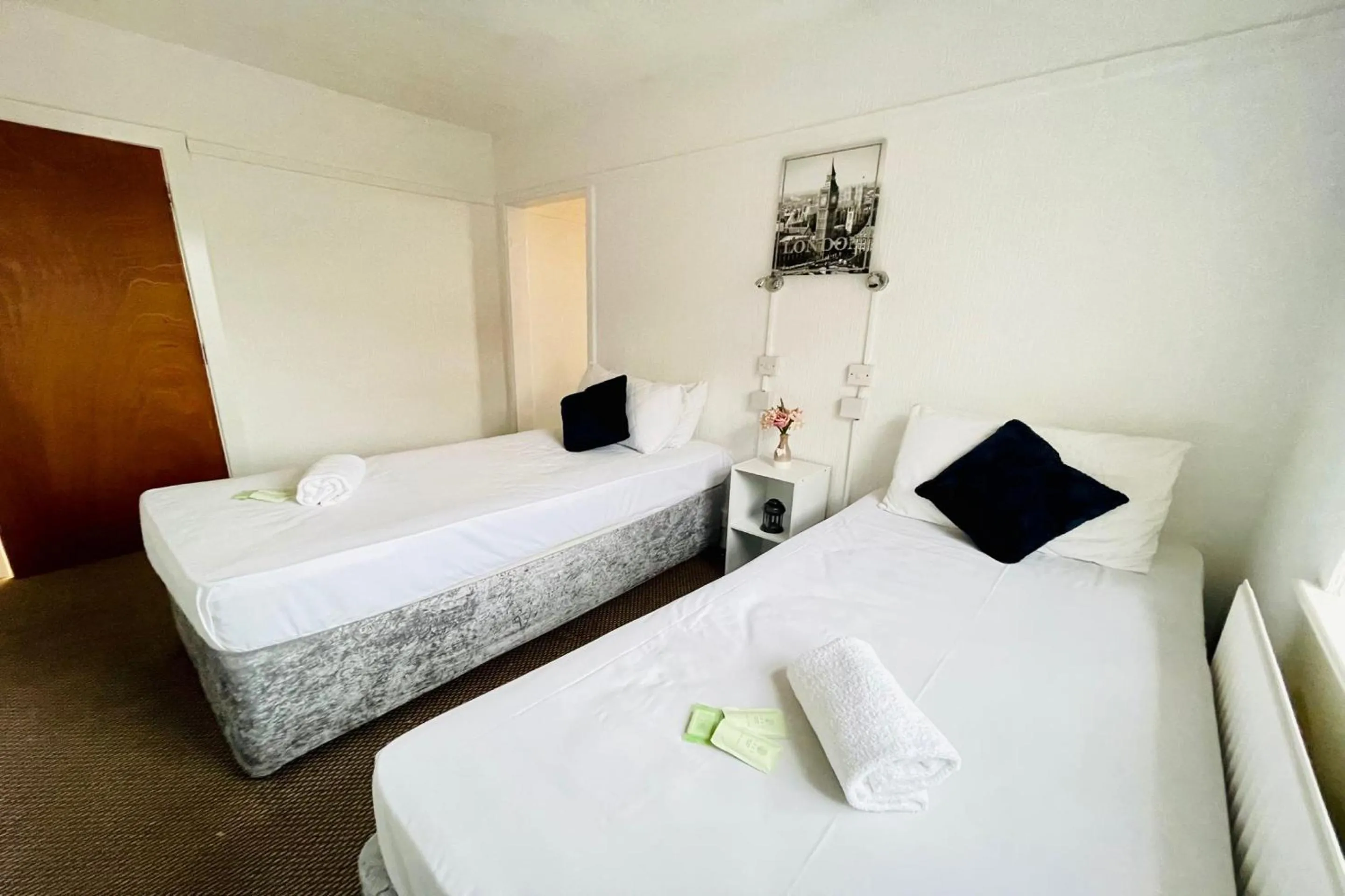 Bedroom in OYO The Sun Hotel