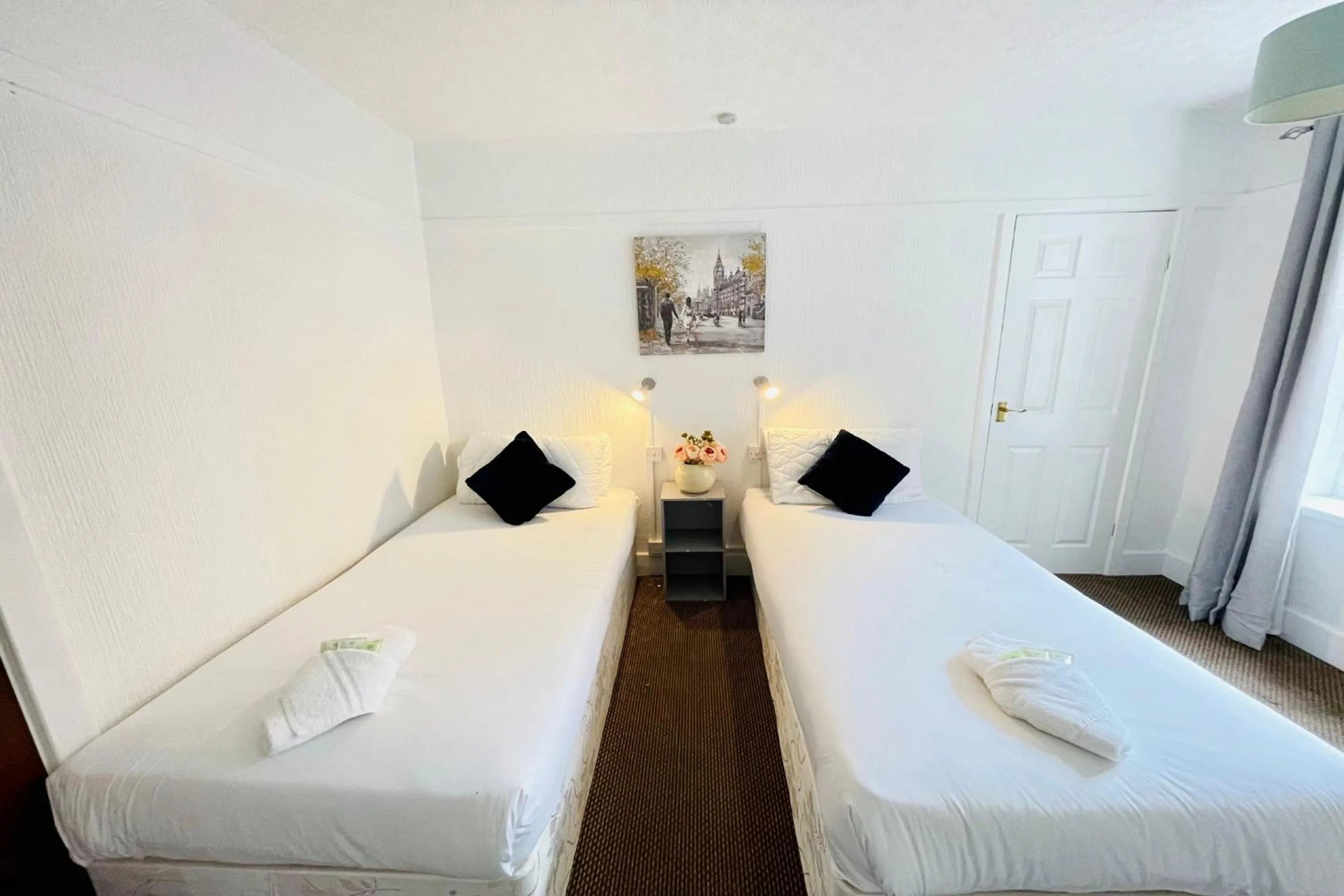 Bedroom in OYO The Sun Hotel