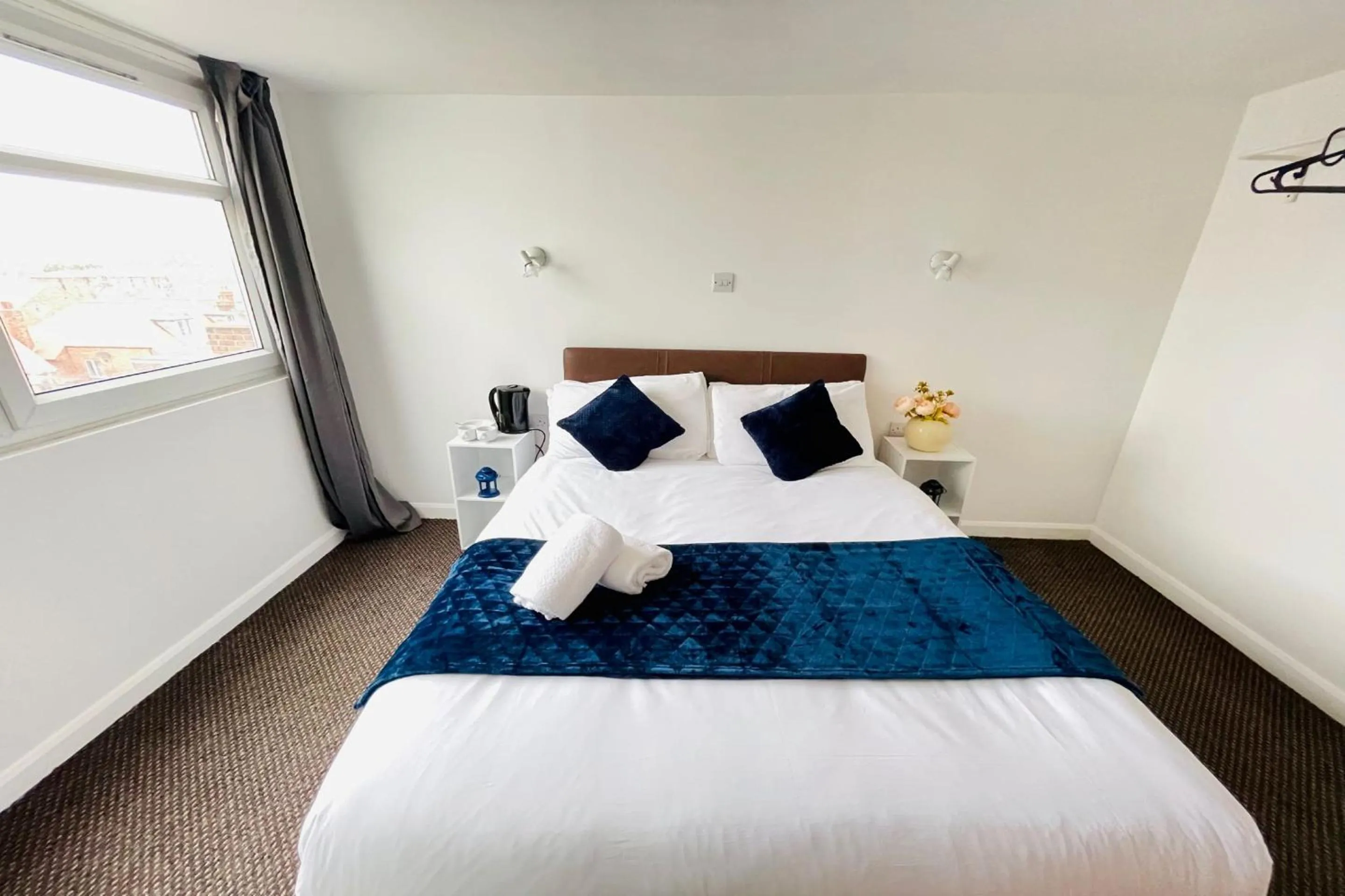 Bedroom in OYO The Sun Hotel