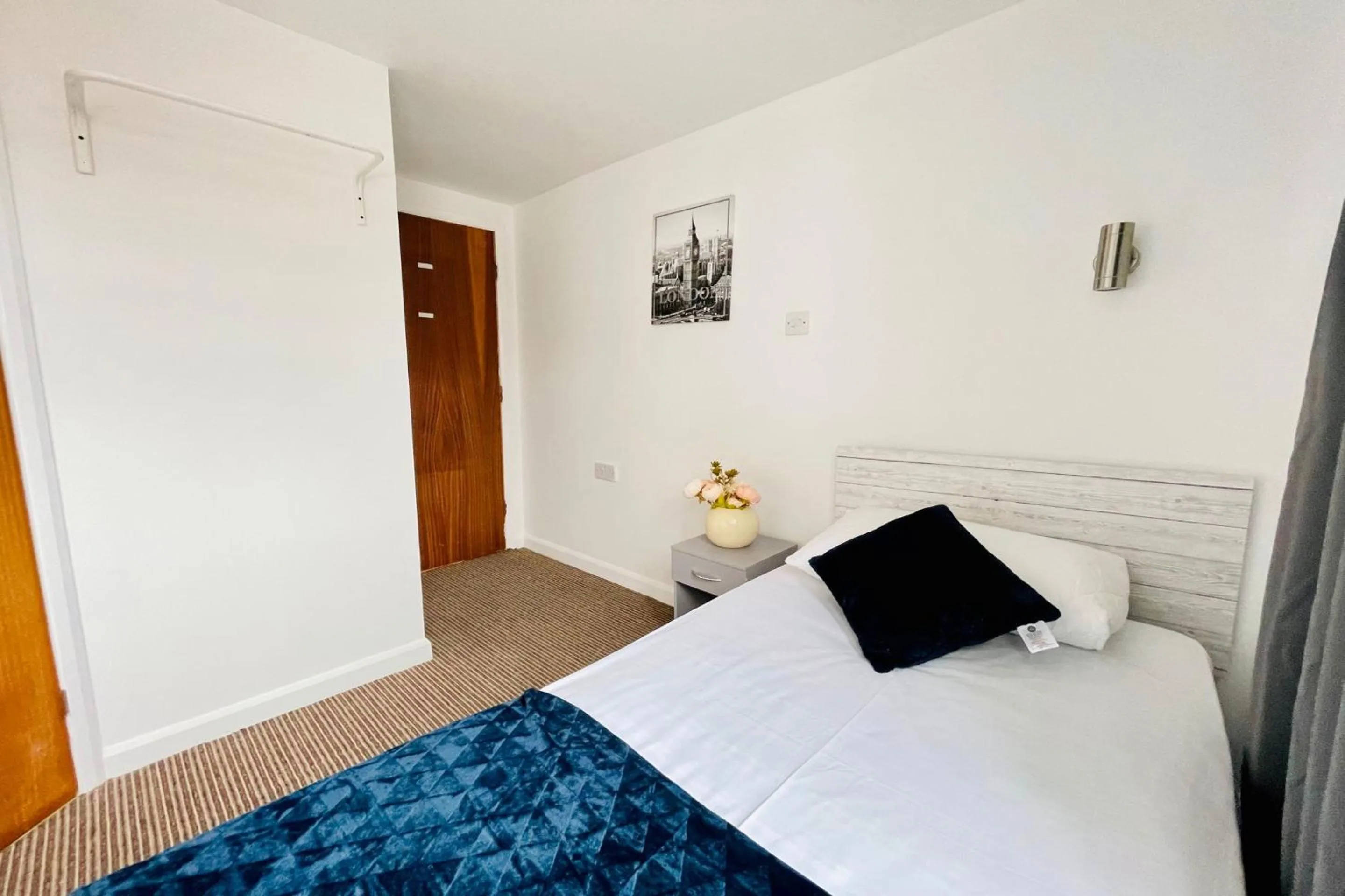 Bedroom in OYO The Sun Hotel