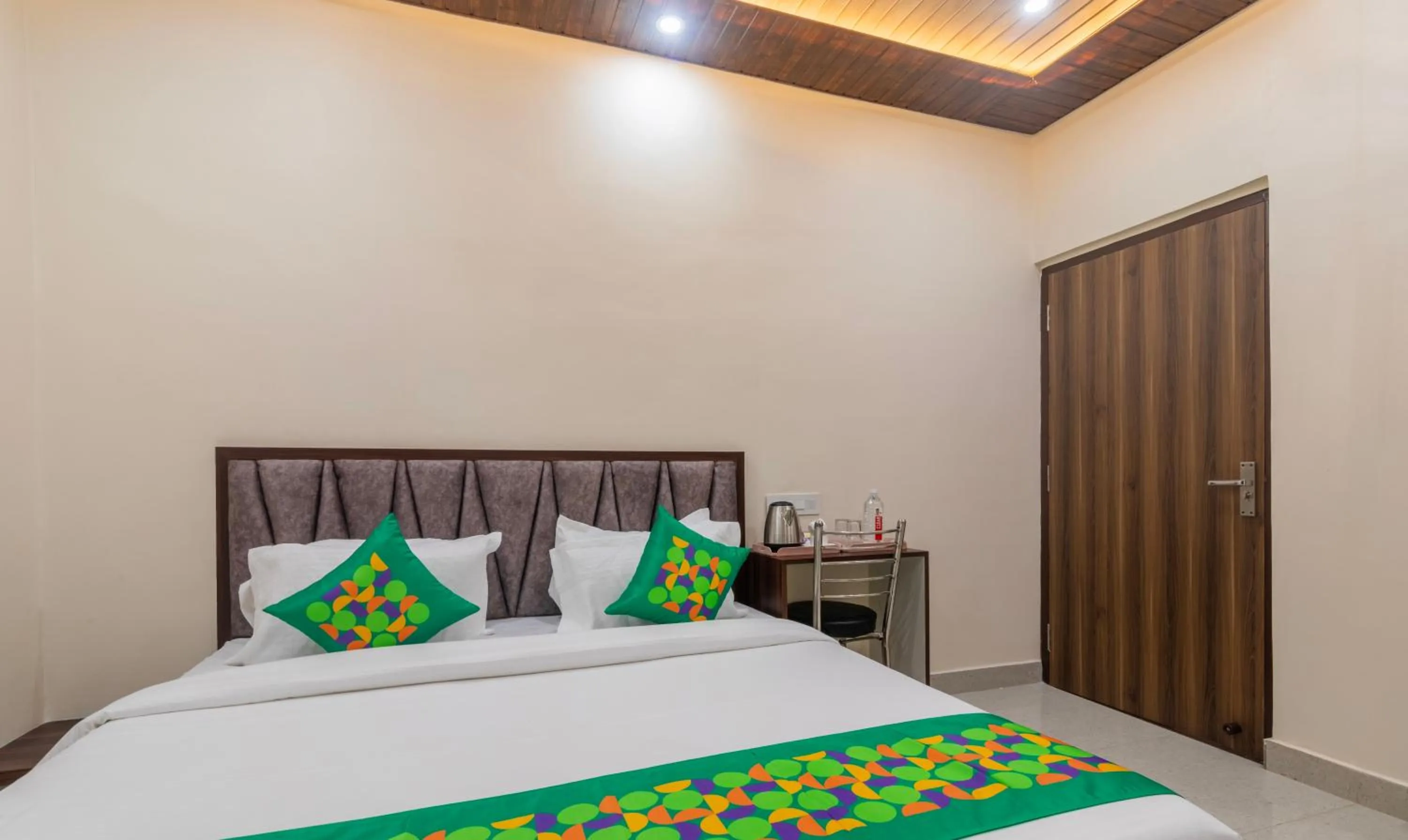 Bedroom, Bed in Treebo Golden Kashi