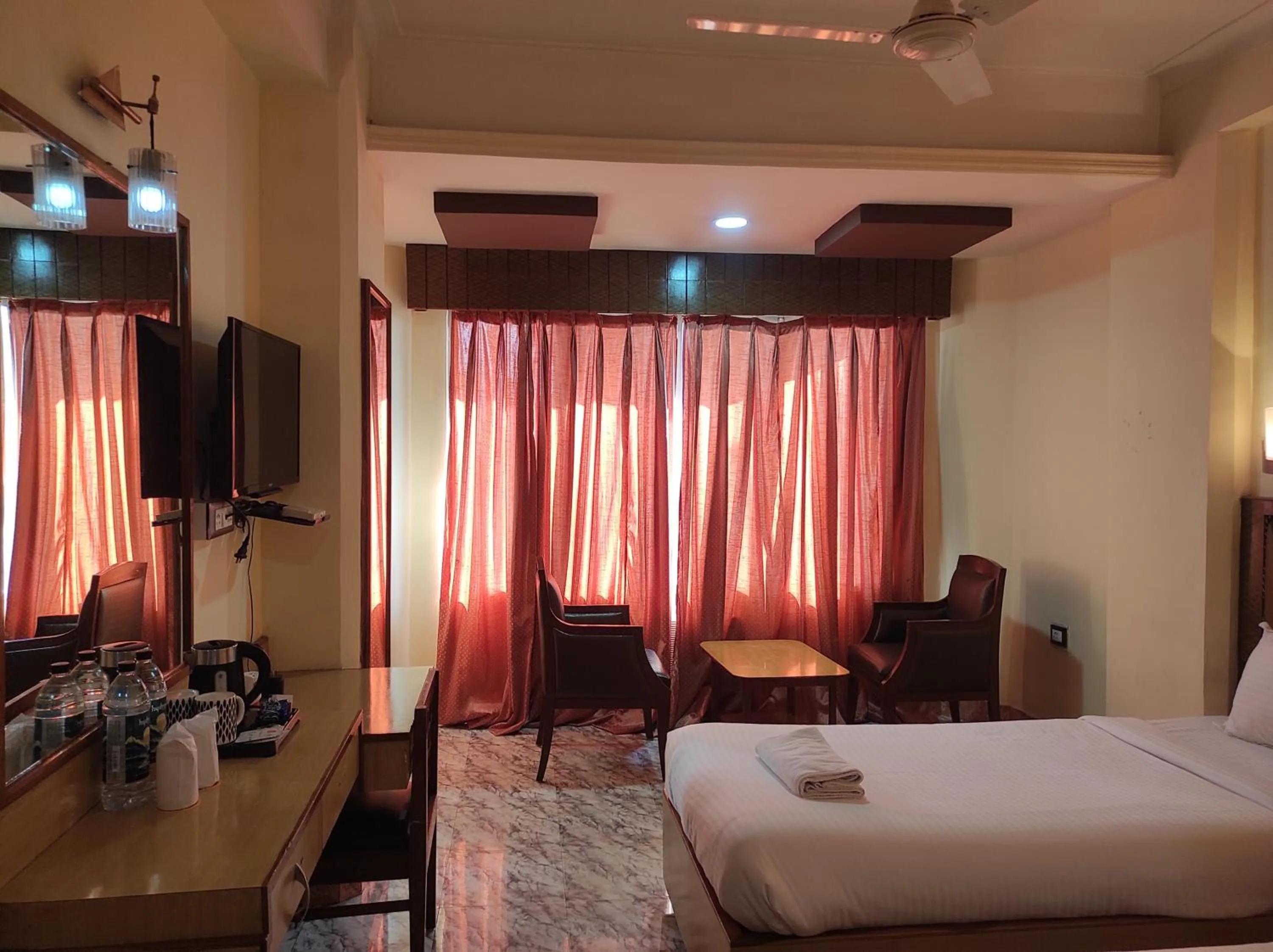Bed in Hotel Ambarish Grand Residency