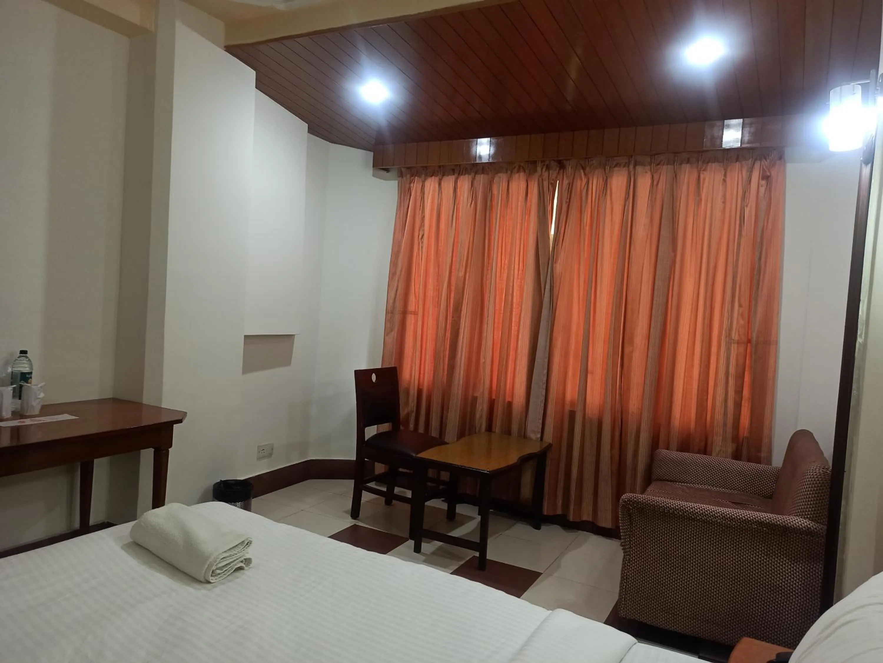 Bed in Hotel Ambarish Grand Residency