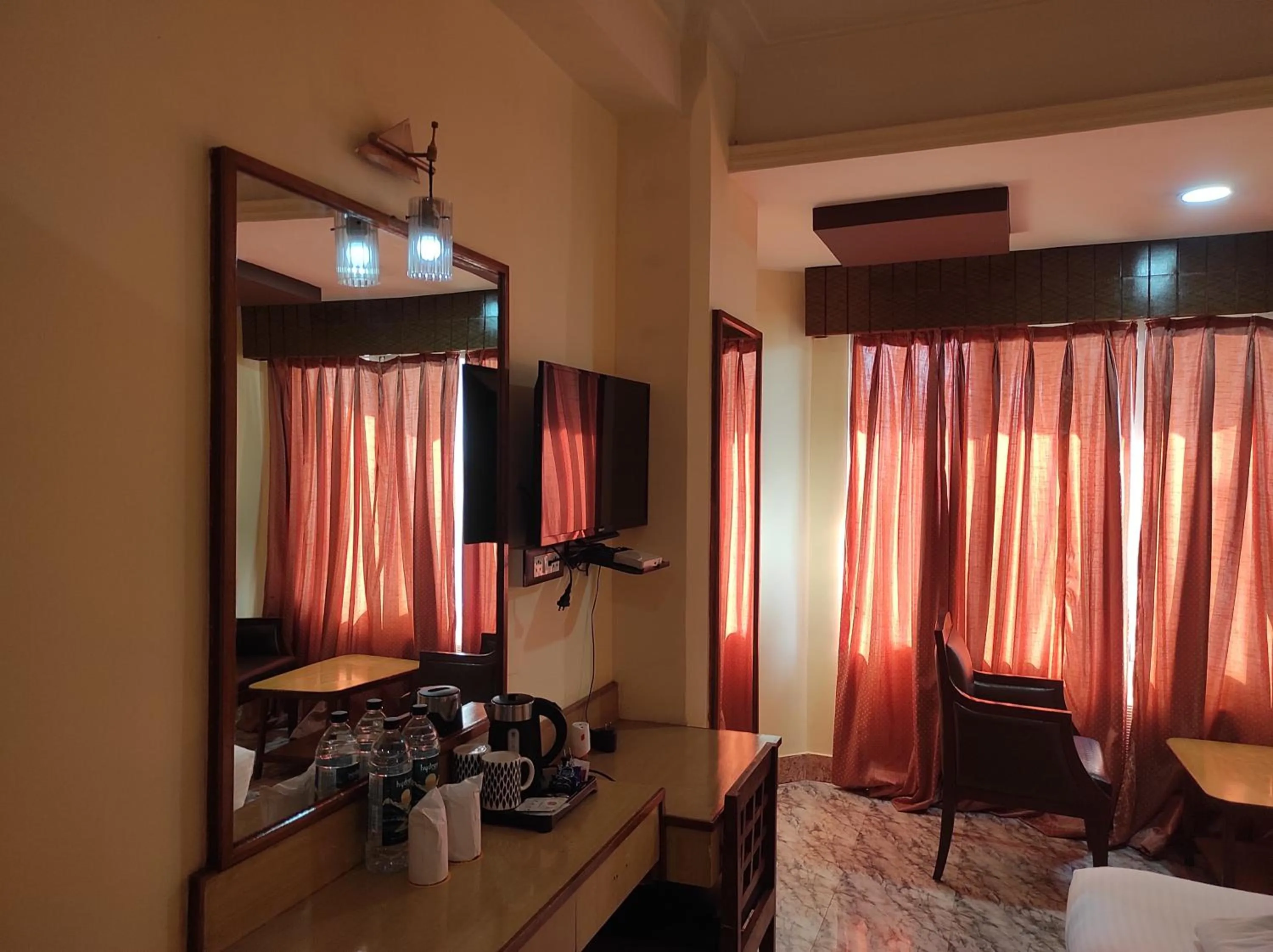 TV and multimedia in Hotel Ambarish Grand Residency