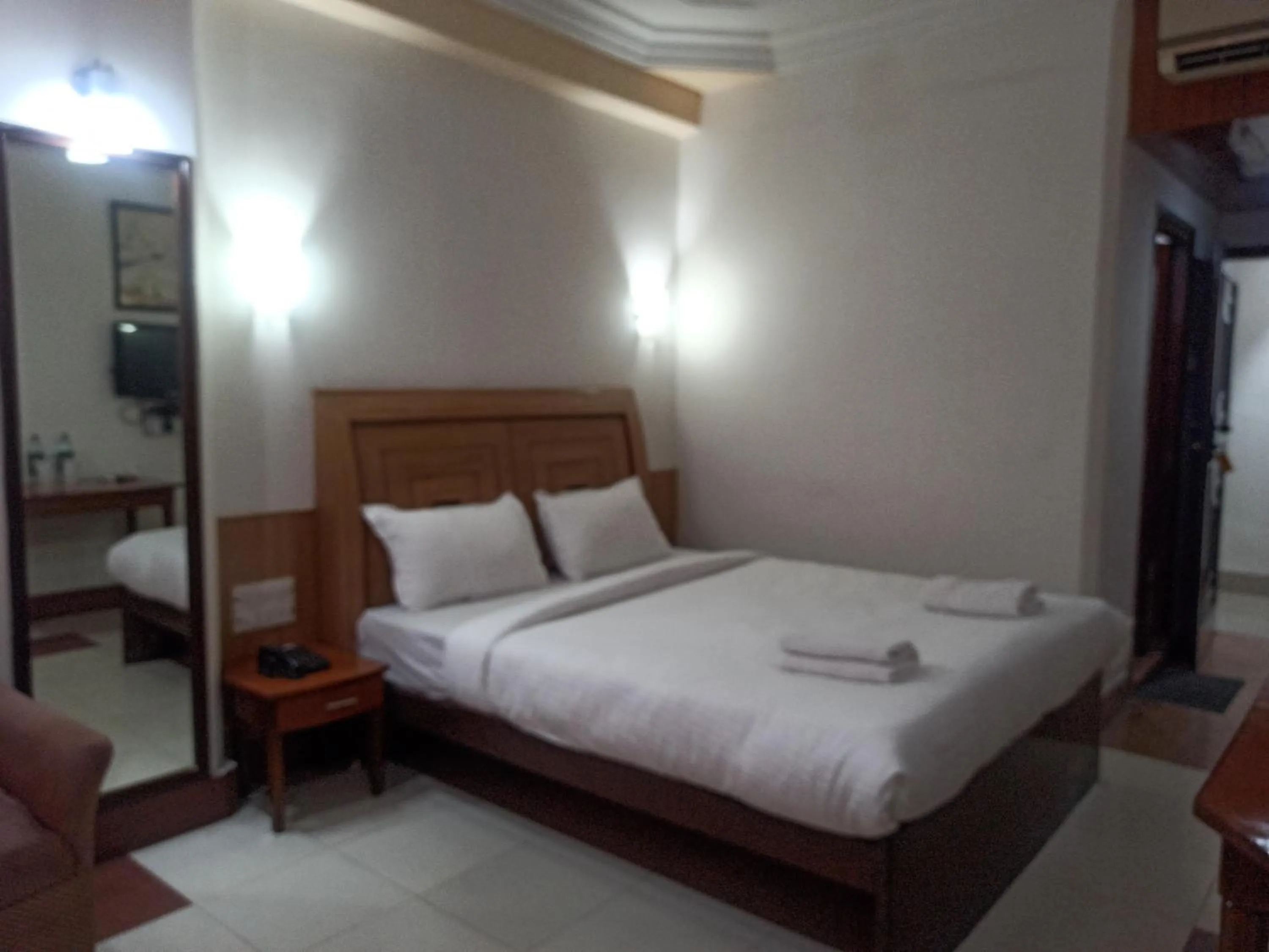 Bed in Hotel Ambarish Grand Residency