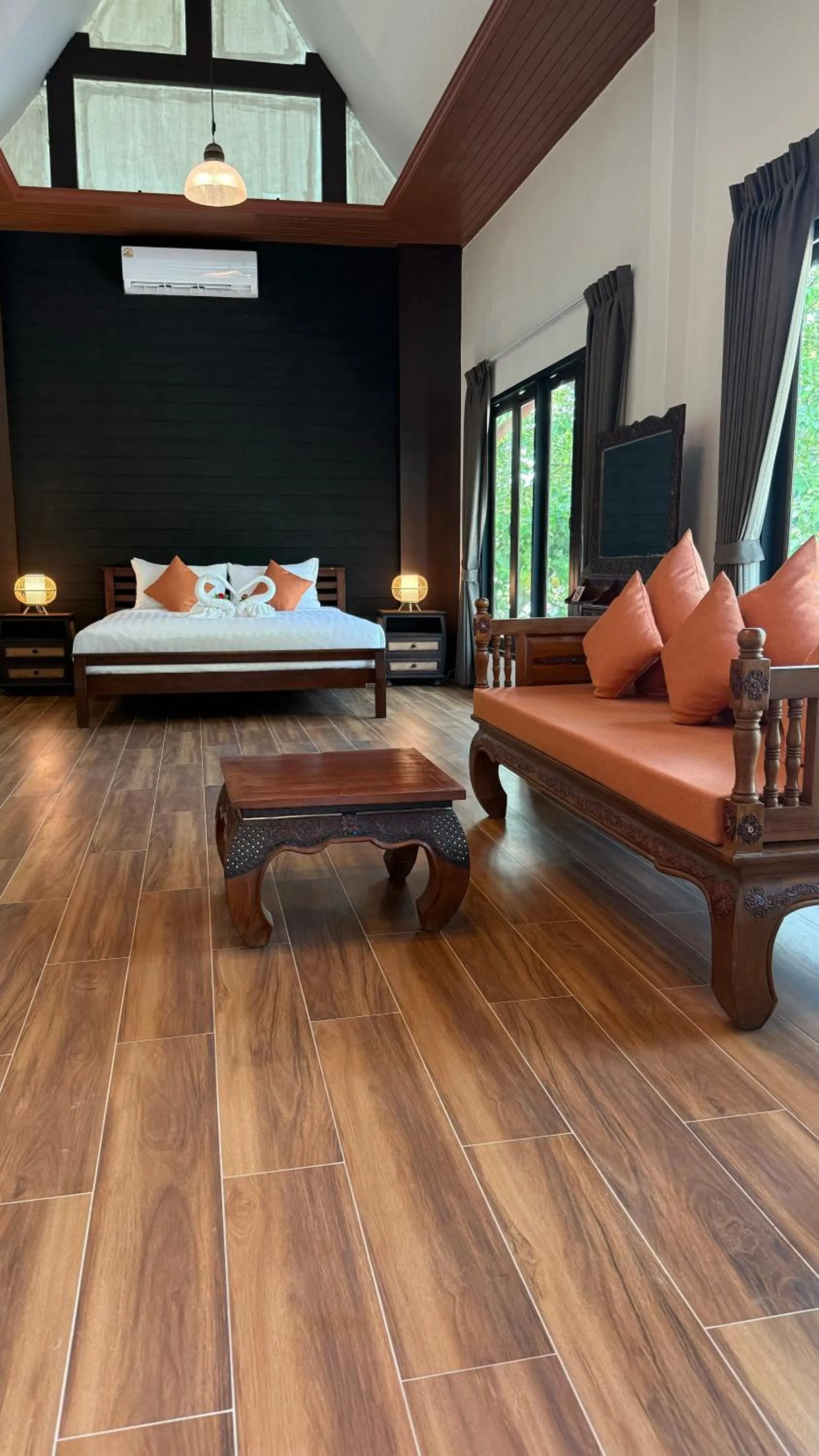 Seating area, Bed in Blue Palm Residence Kata