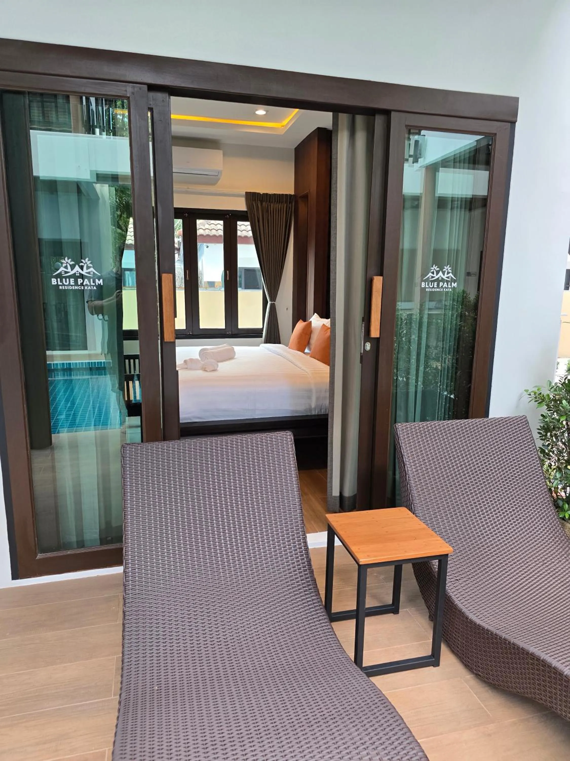 Balcony/Terrace, Bed in Blue Palm Residence Kata