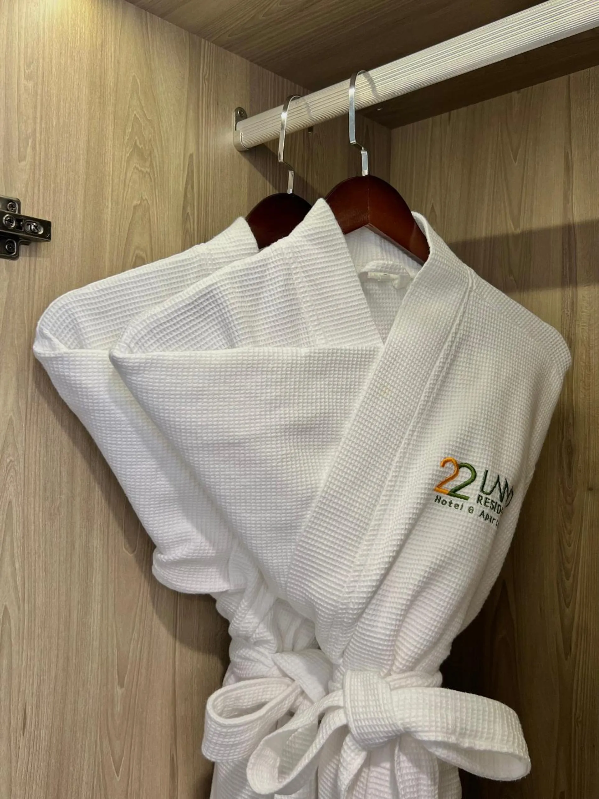 wardrobe in 22Land Legend Hotel & Residence