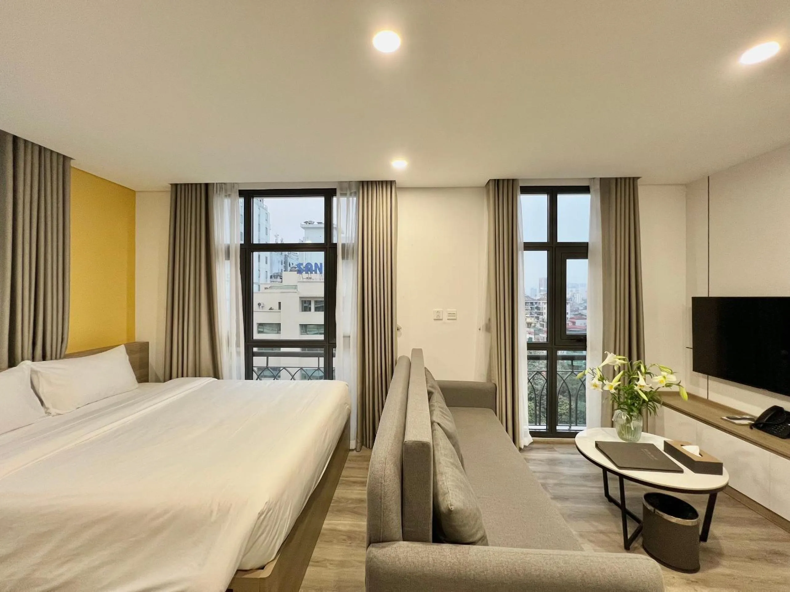 Communal lounge/ TV room, Bed in 22Land Legend Hotel & Residence