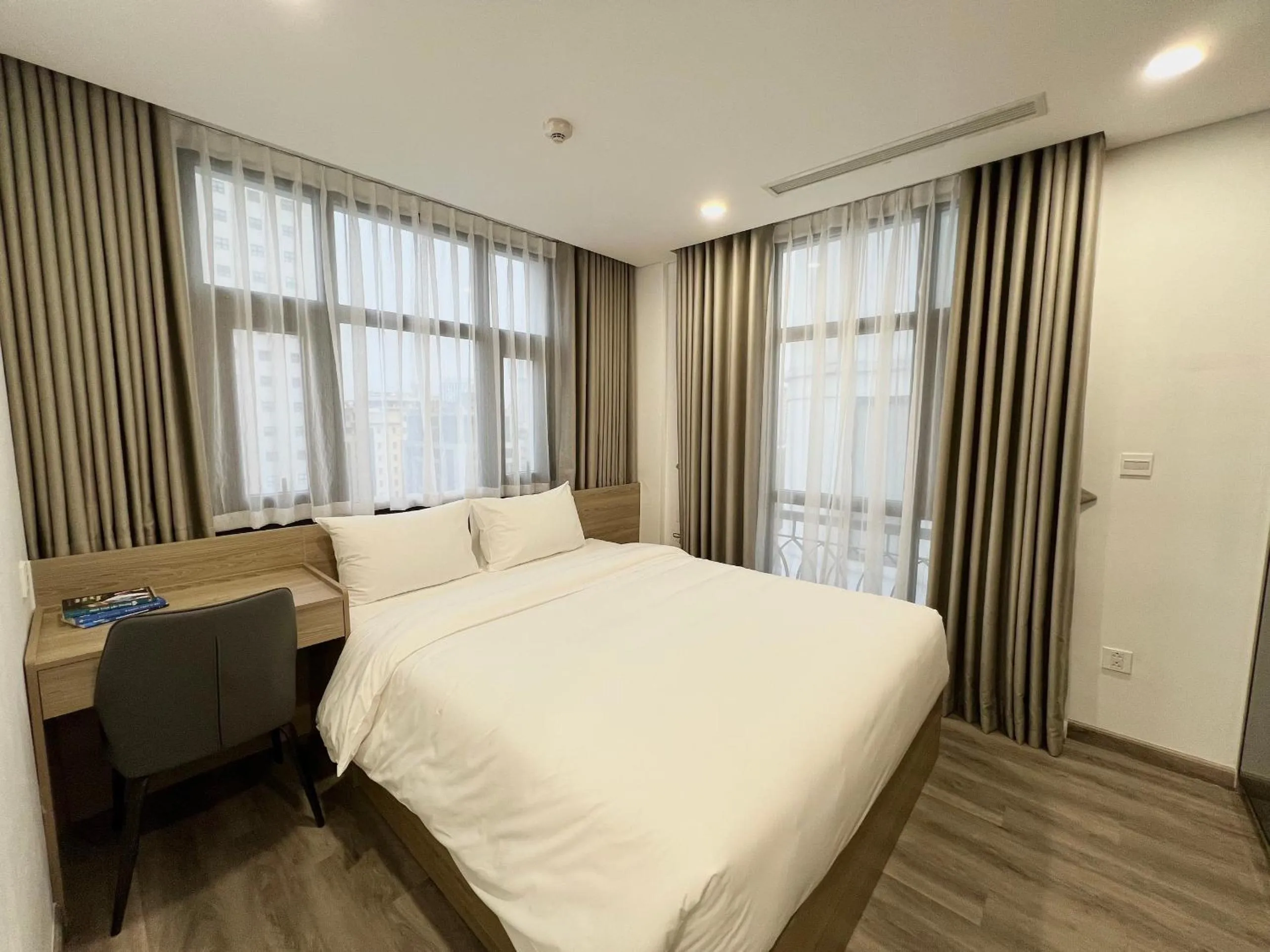 Bed in 22Land Legend Hotel & Residence