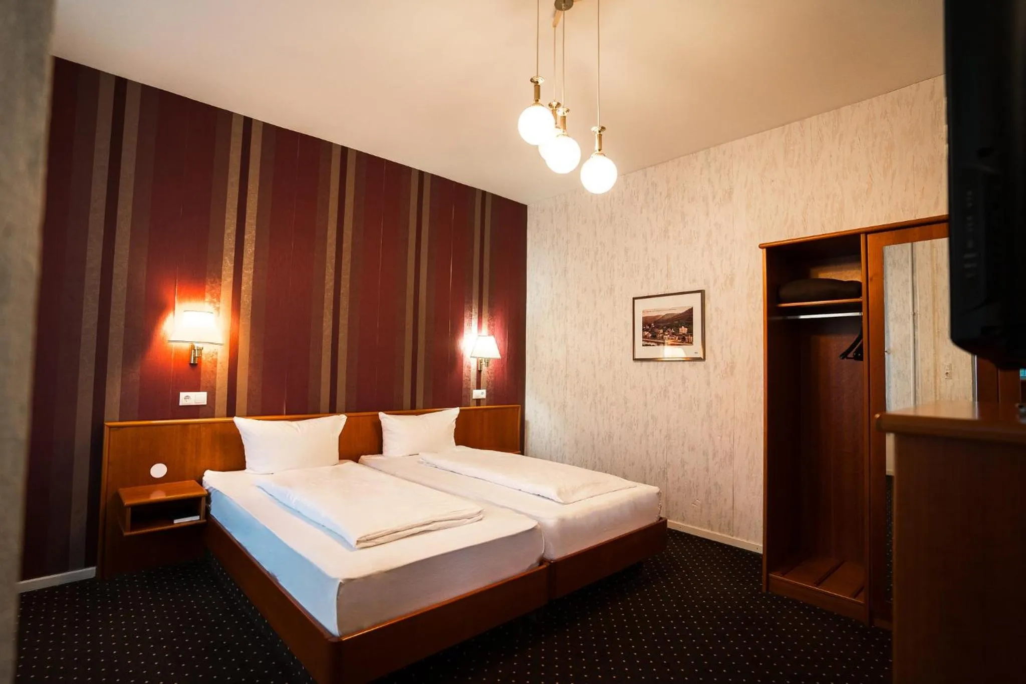 Photo of the whole room, Bed in Trip Inn Parkhotel Bad Ems