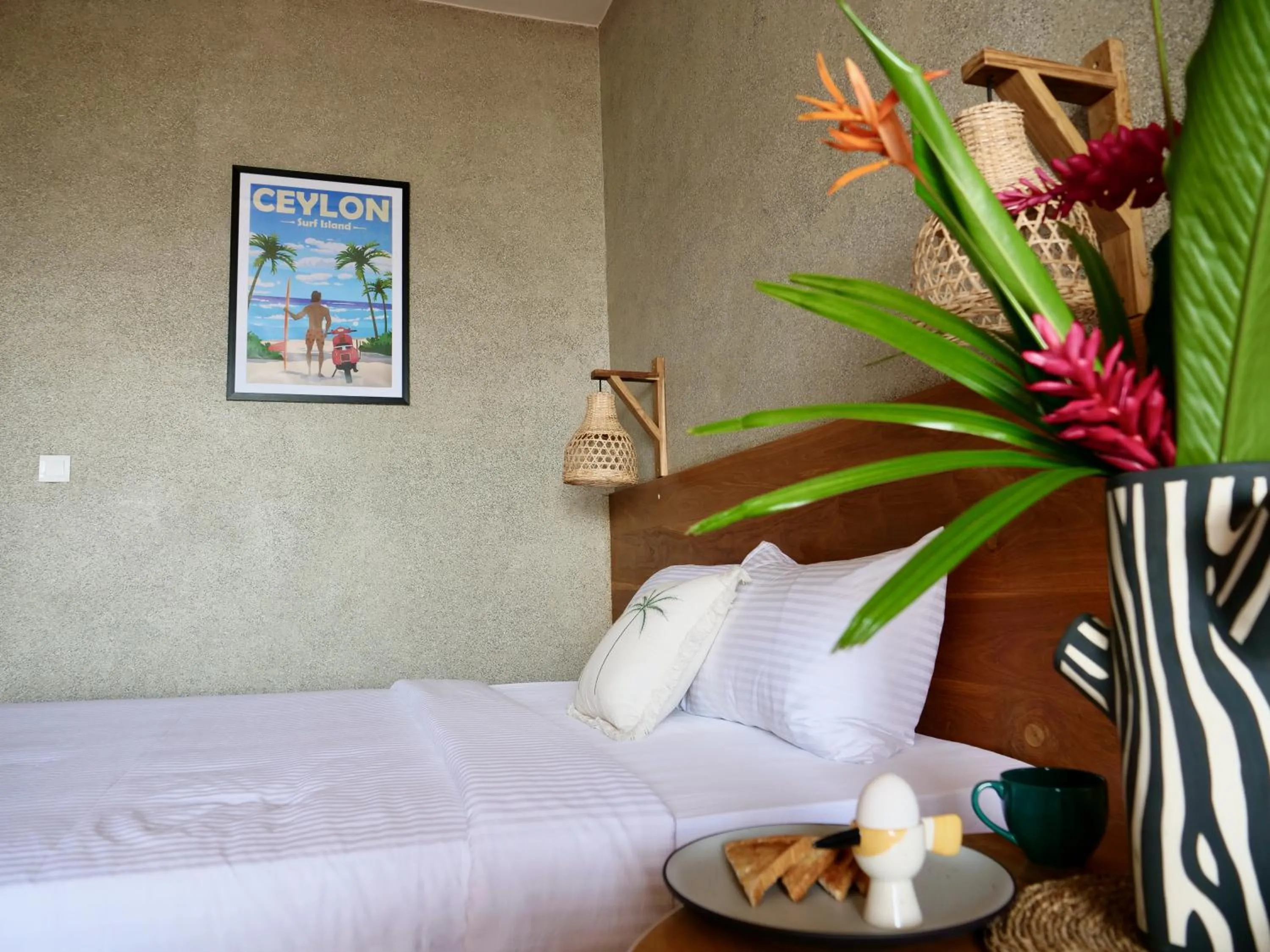 Bed in Coast 67 Boutique Hotel