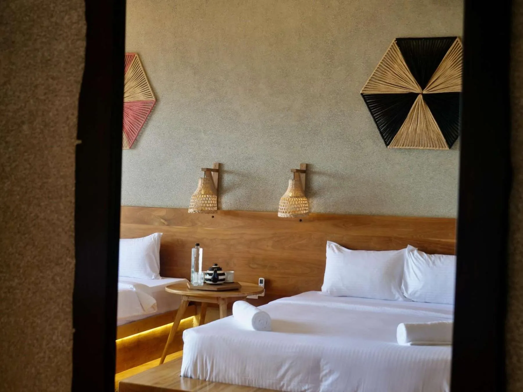 Decorative detail, Bed in Coast 67 Boutique Hotel