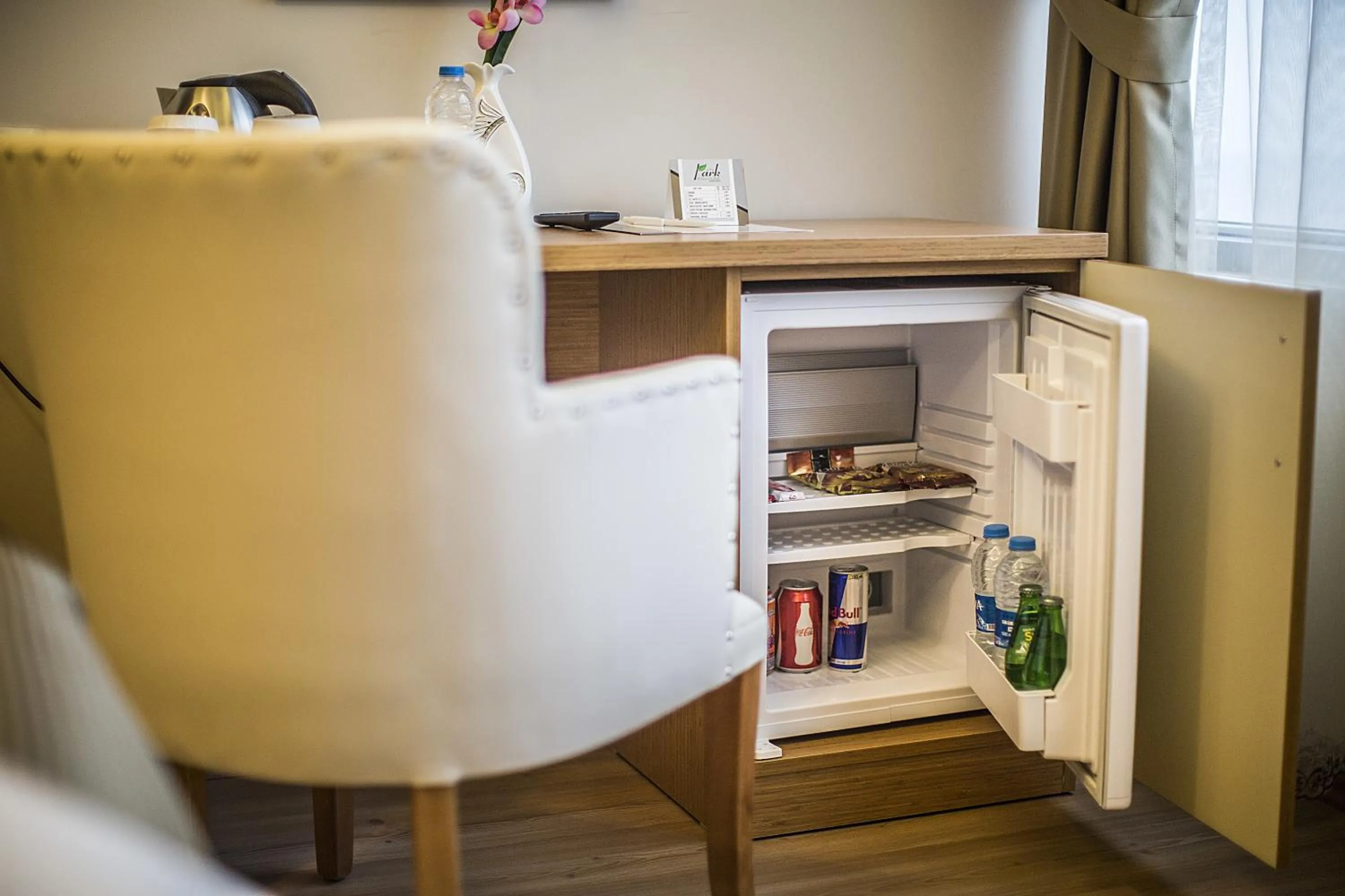 Communal lounge/ TV room in Park Square Hotel